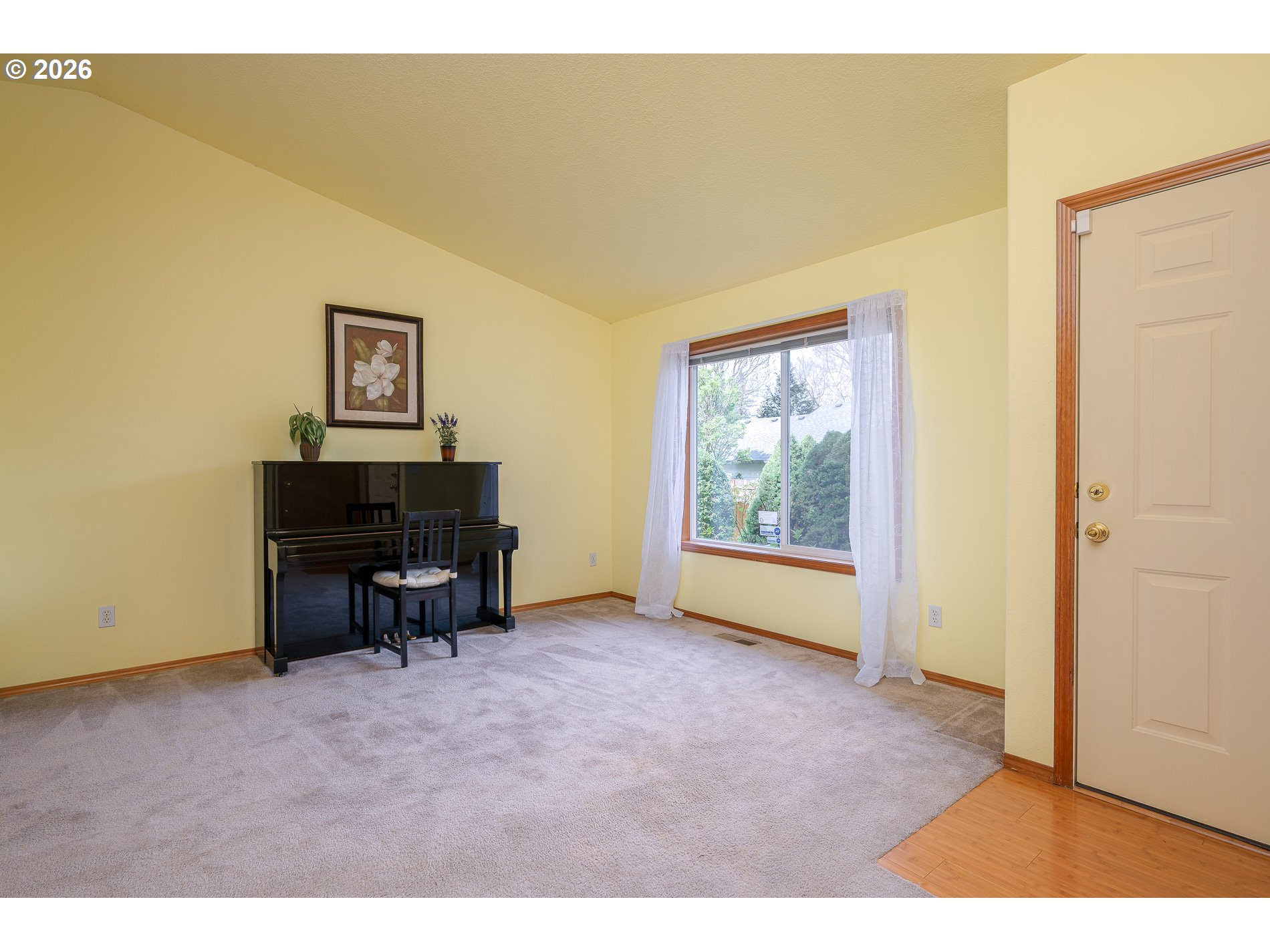 14300 Southeast Center Street Portland, OR 97236 - Photo 5 of 48 a view of a room with furniture and a window