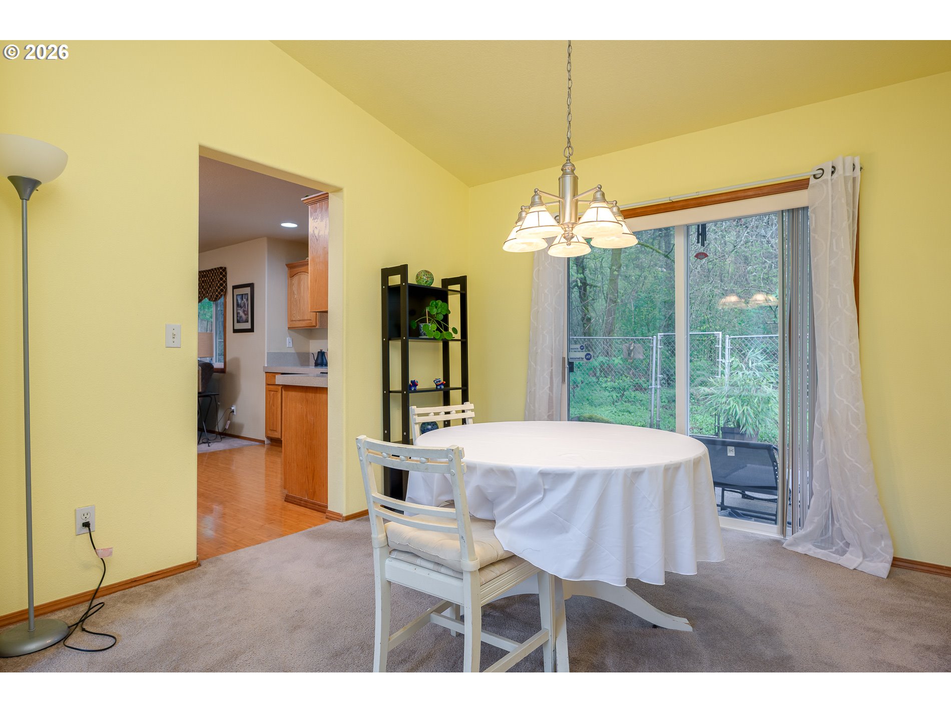 14300 Southeast Center Street Portland, OR 97236 - Photo 10 of 48 a dining room with a table and chairs
