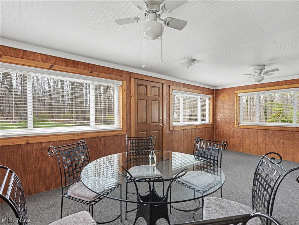 8406 Whipporwill Road Ravenna, OH 44266 - Photo 18 of 26 Enclosed porch overlooking the backyard