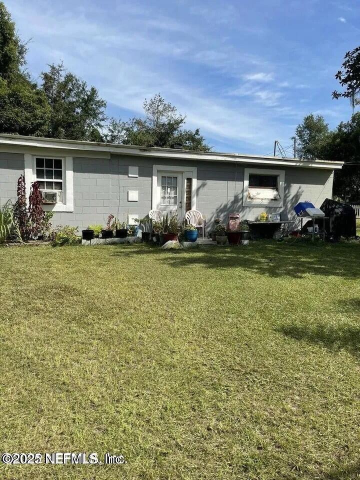 10603 Briarcliff Road East Jacksonville, FL 32218 - Photo 1 of 1 a view of a house with backyard