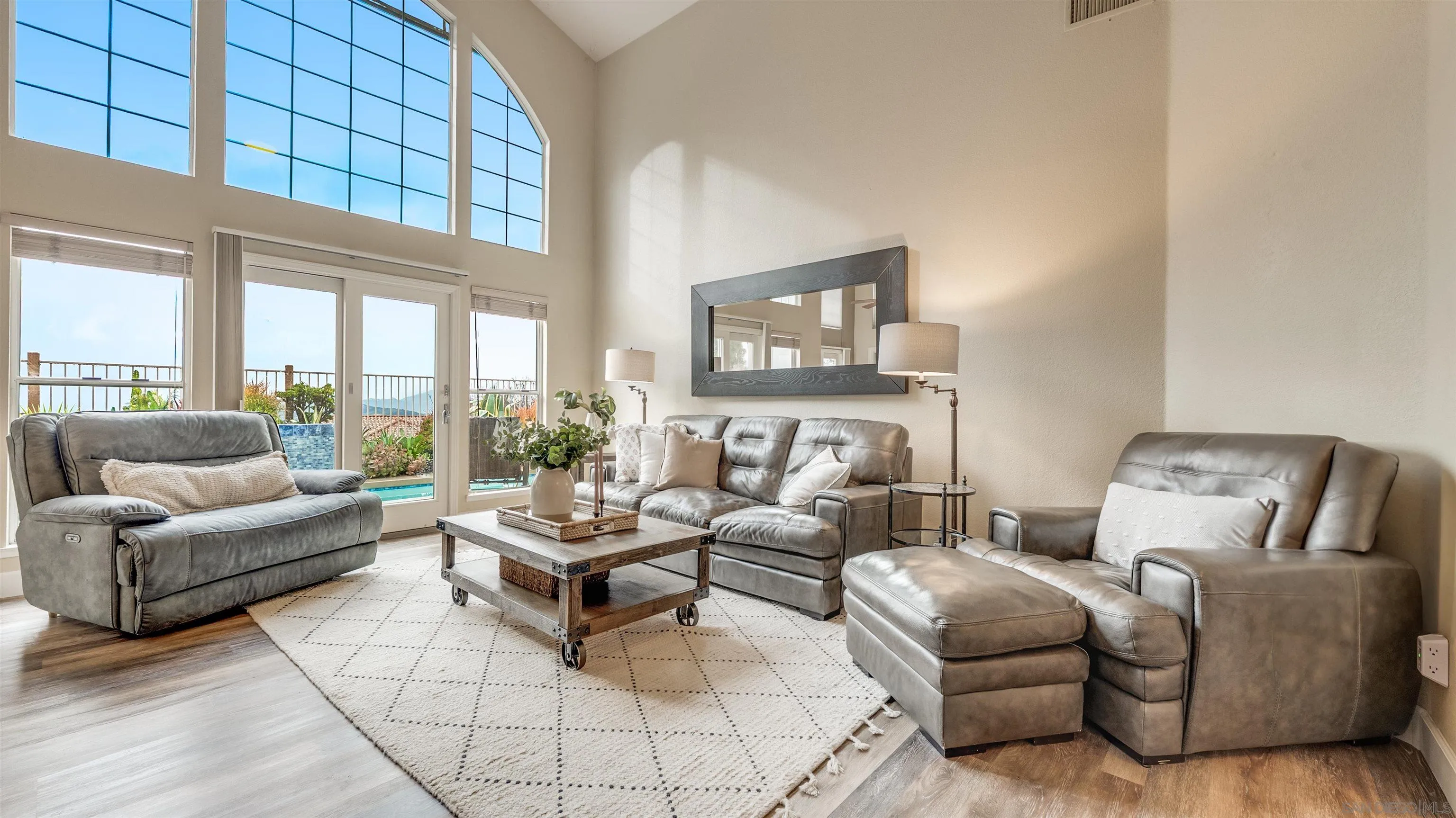 2352 Rock Crest Glen Escondido, CA 92026 - Photo 12 of 48 a living room with furniture and a large window