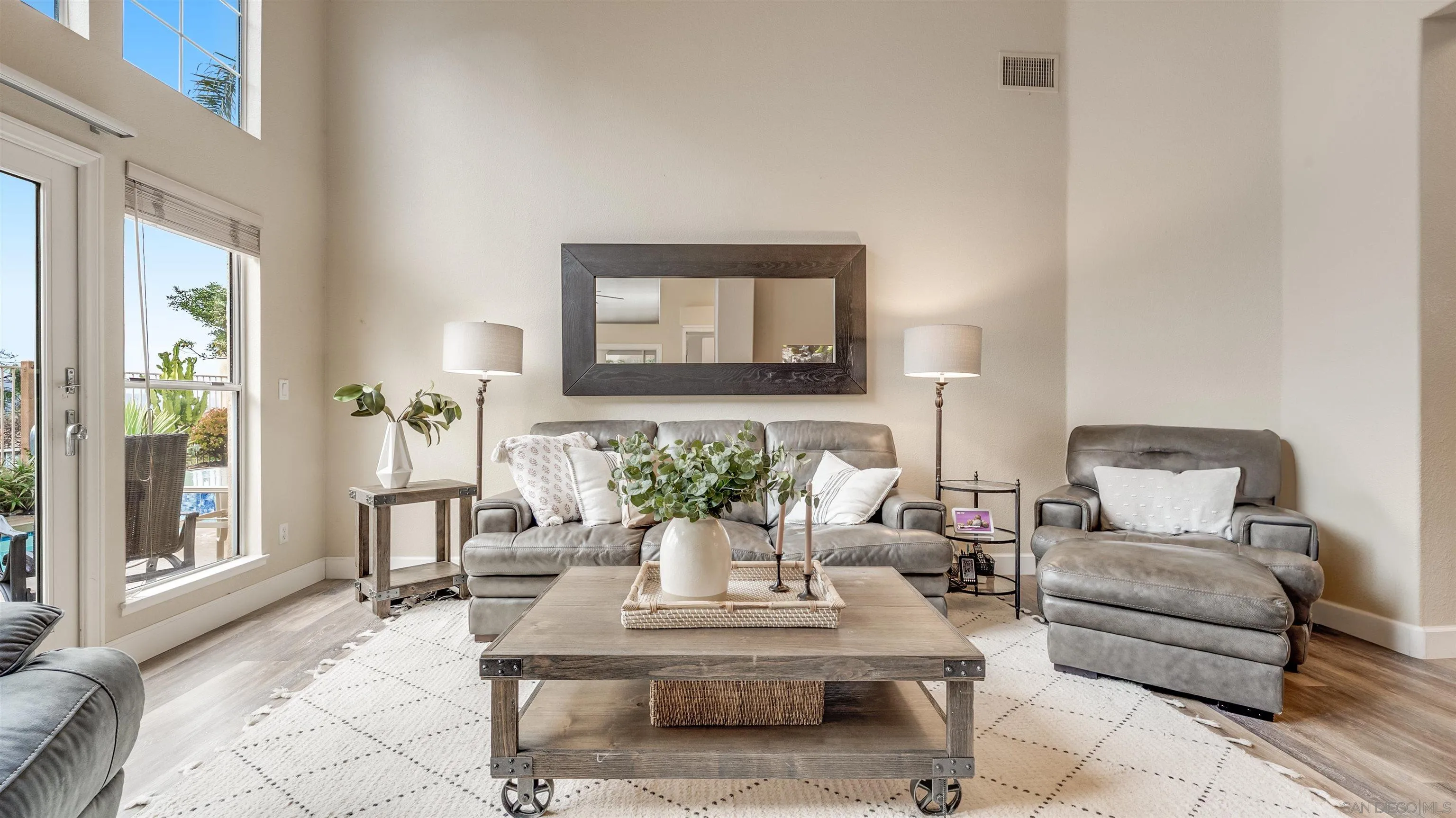 2352 Rock Crest Glen Escondido, CA 92026 - Photo 13 of 48 a living room with furniture and windows