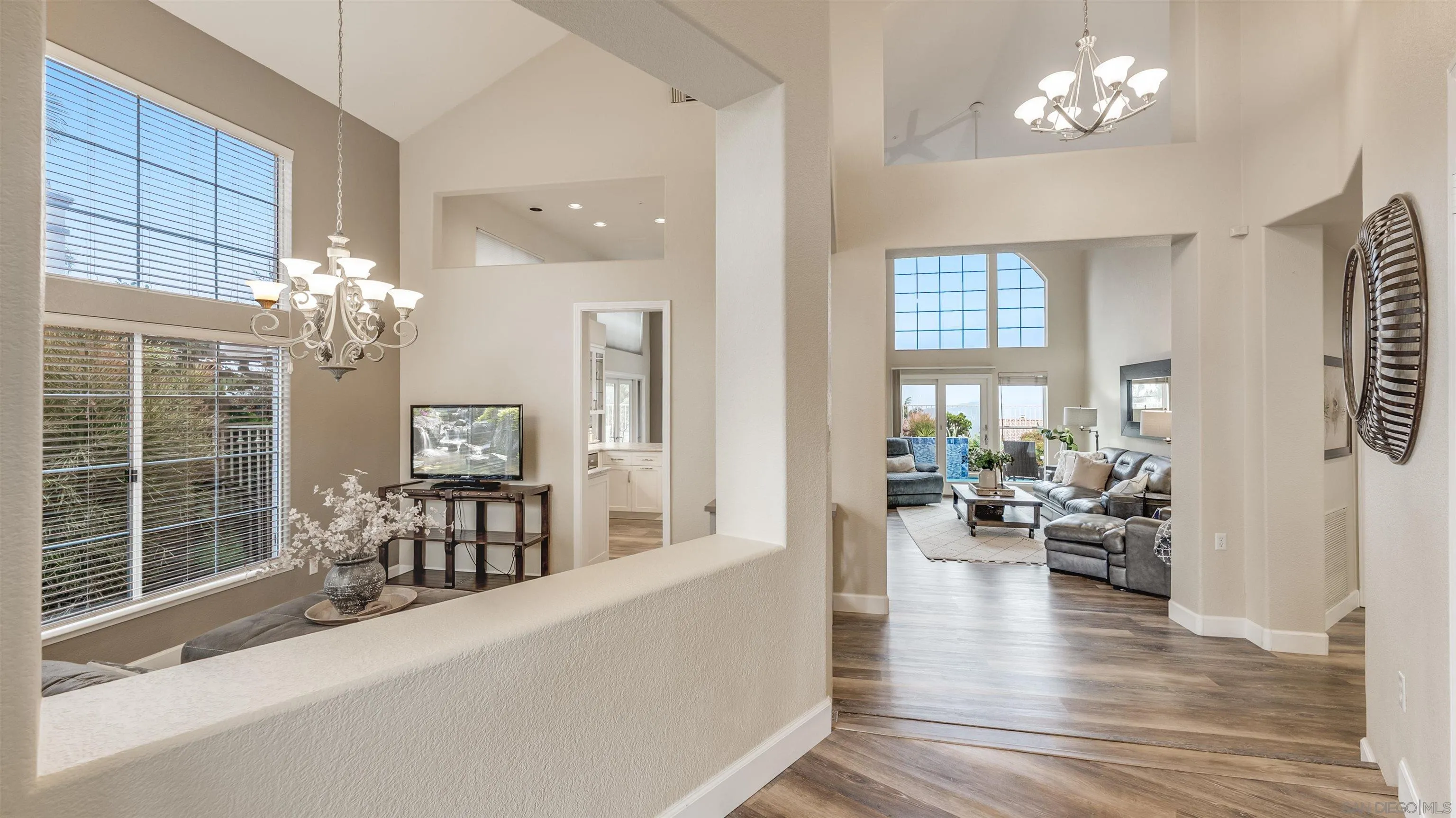 2352 Rock Crest Glen Escondido, CA 92026 - Photo 14 of 48 a living room with furniture chandelier and a table