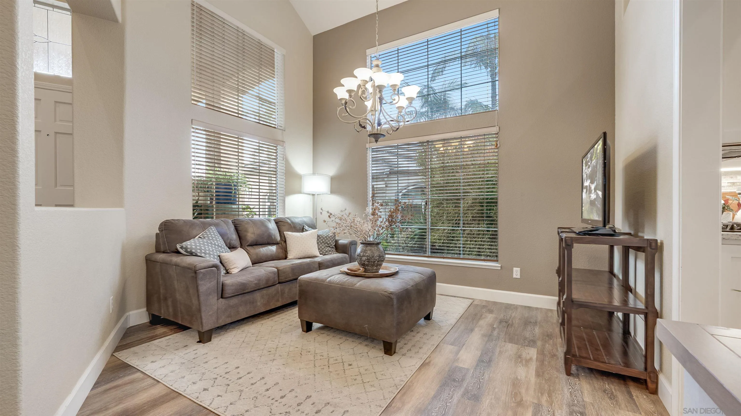 2352 Rock Crest Glen Escondido, CA 92026 - Photo 15 of 48 a living room with furniture and a large window