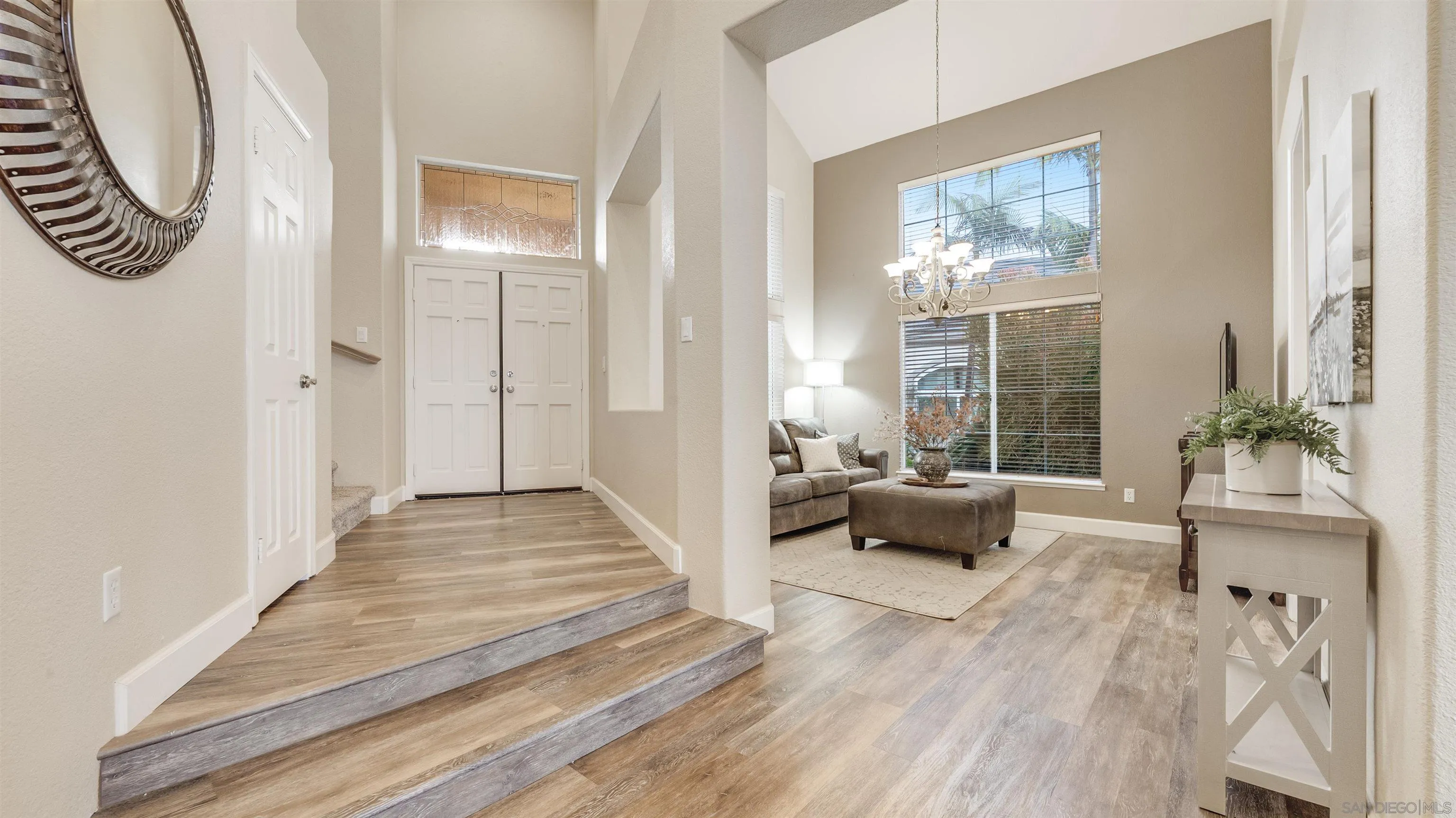 2352 Rock Crest Glen Escondido, CA 92026 - Photo 17 of 48 a bedroom with furniture and a large window