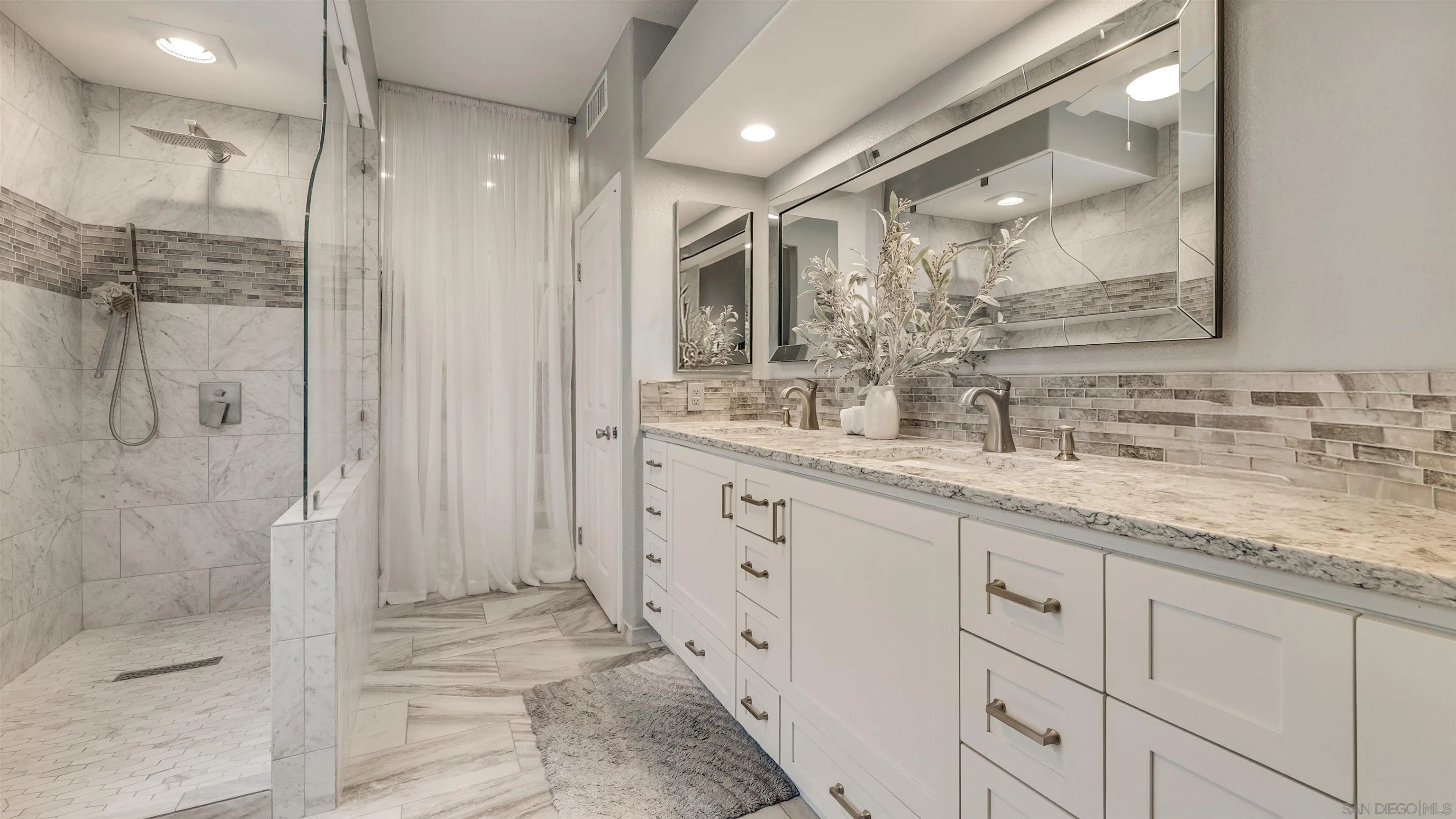 2352 Rock Crest Glen Escondido, CA 92026 - Photo 21 of 48 a bathroom with a granite countertop sink mirror and double