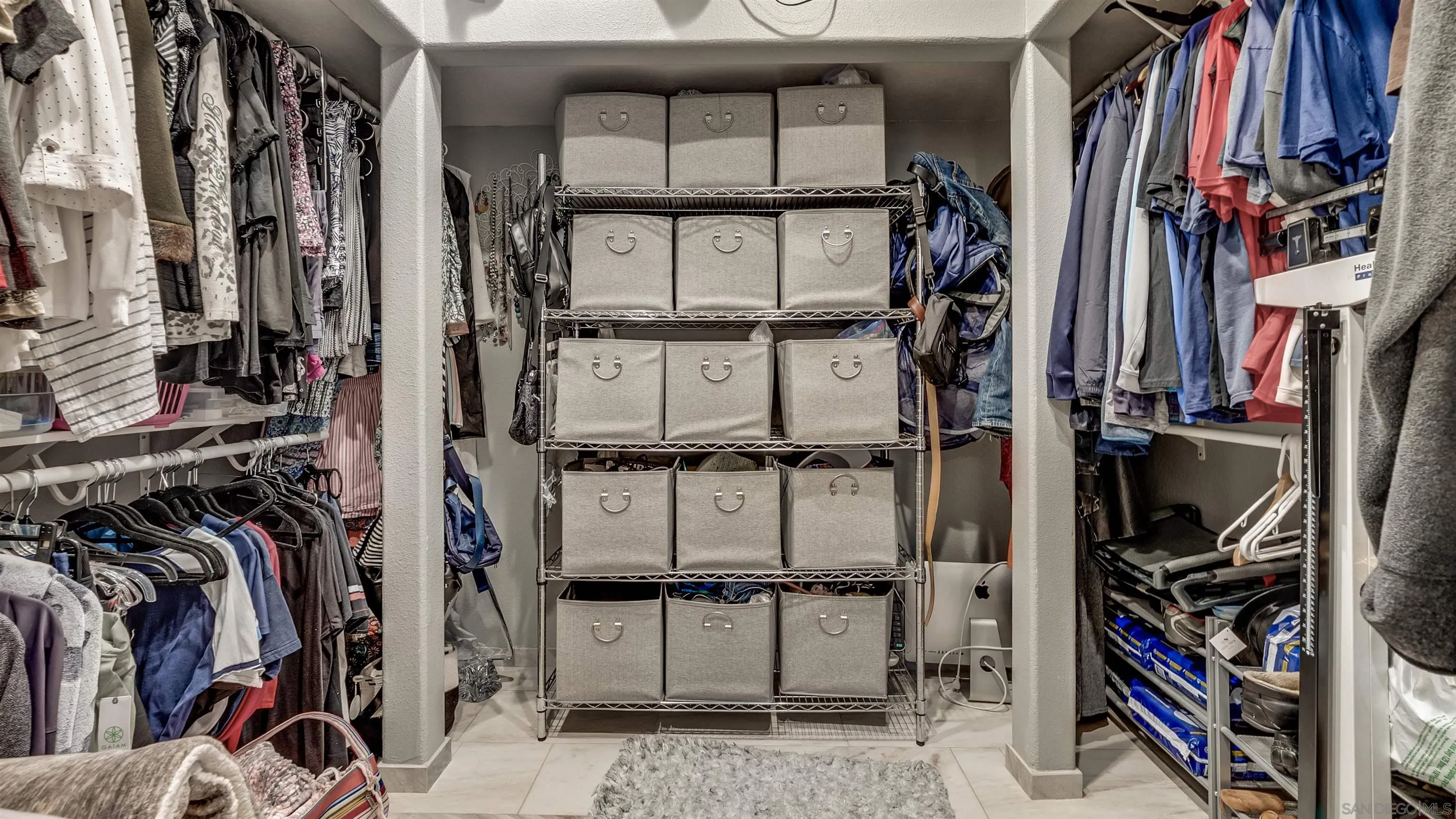 2352 Rock Crest Glen Escondido, CA 92026 - Photo 22 of 48 a view of walk in closet with clothes and shoes