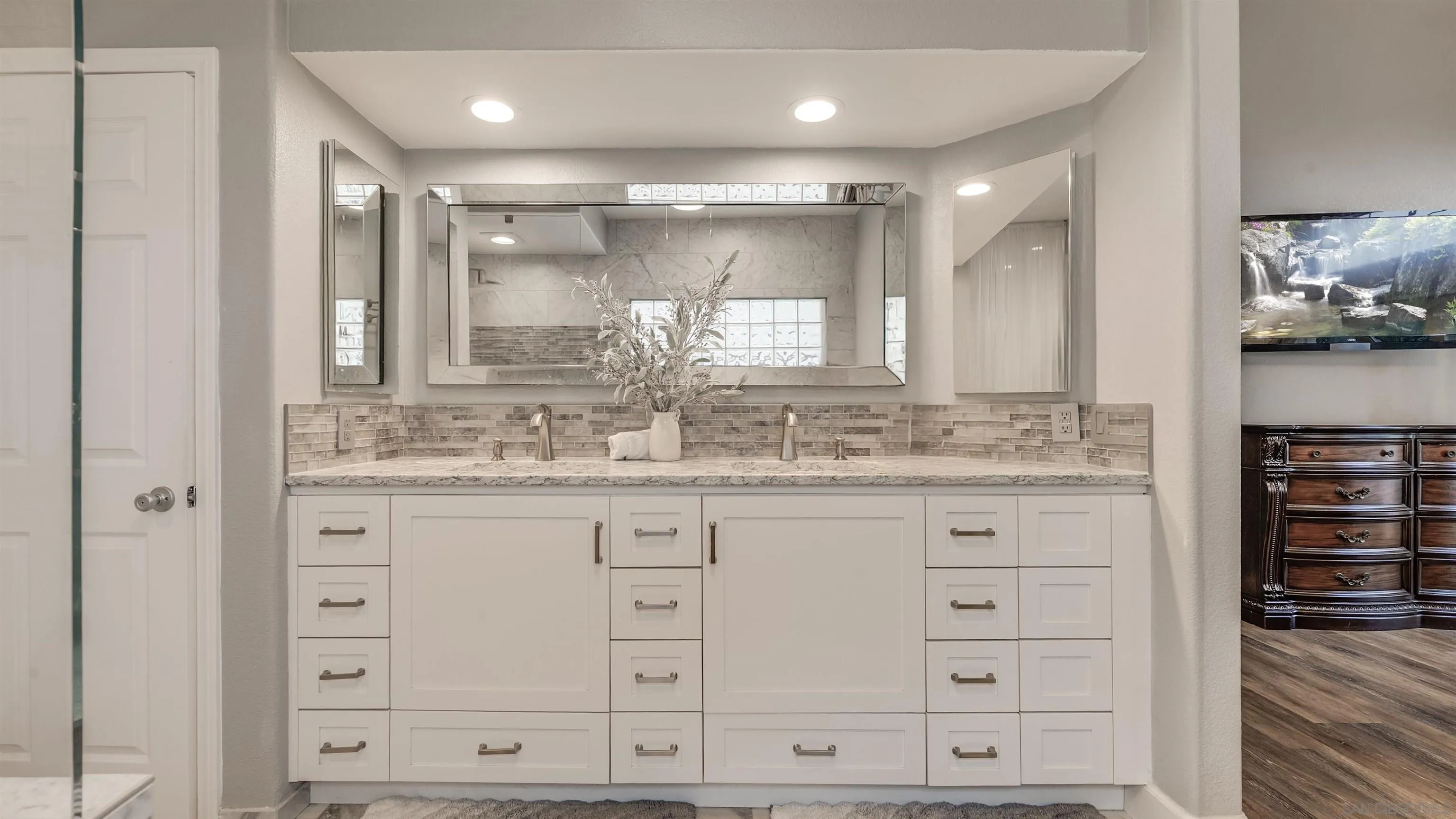 2352 Rock Crest Glen Escondido, CA 92026 - Photo 23 of 48 a bathroom with a granite countertop sink mirror and