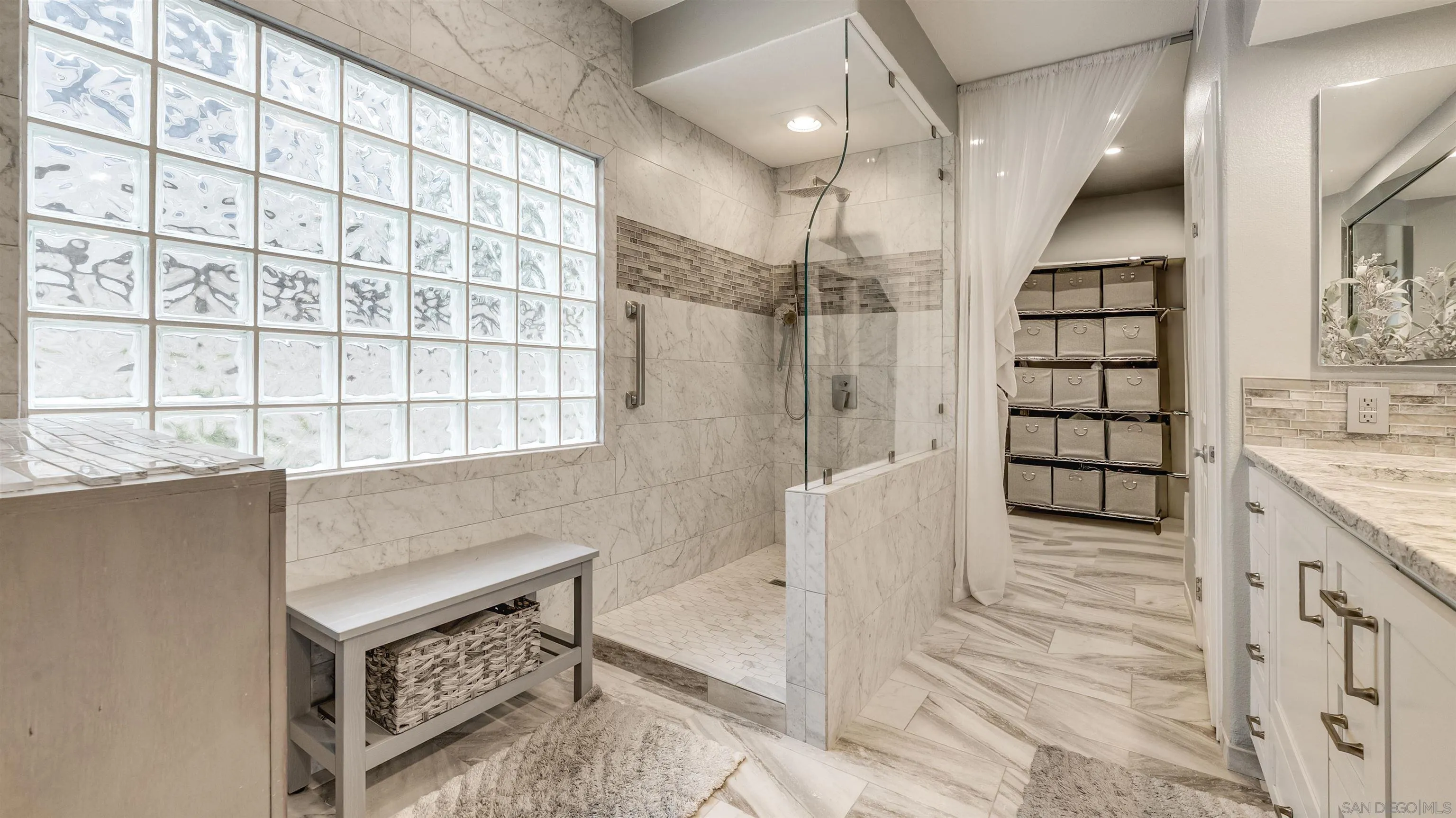 2352 Rock Crest Glen Escondido, CA 92026 - Photo 26 of 48 a view of an empty walk in closet and a bathroom