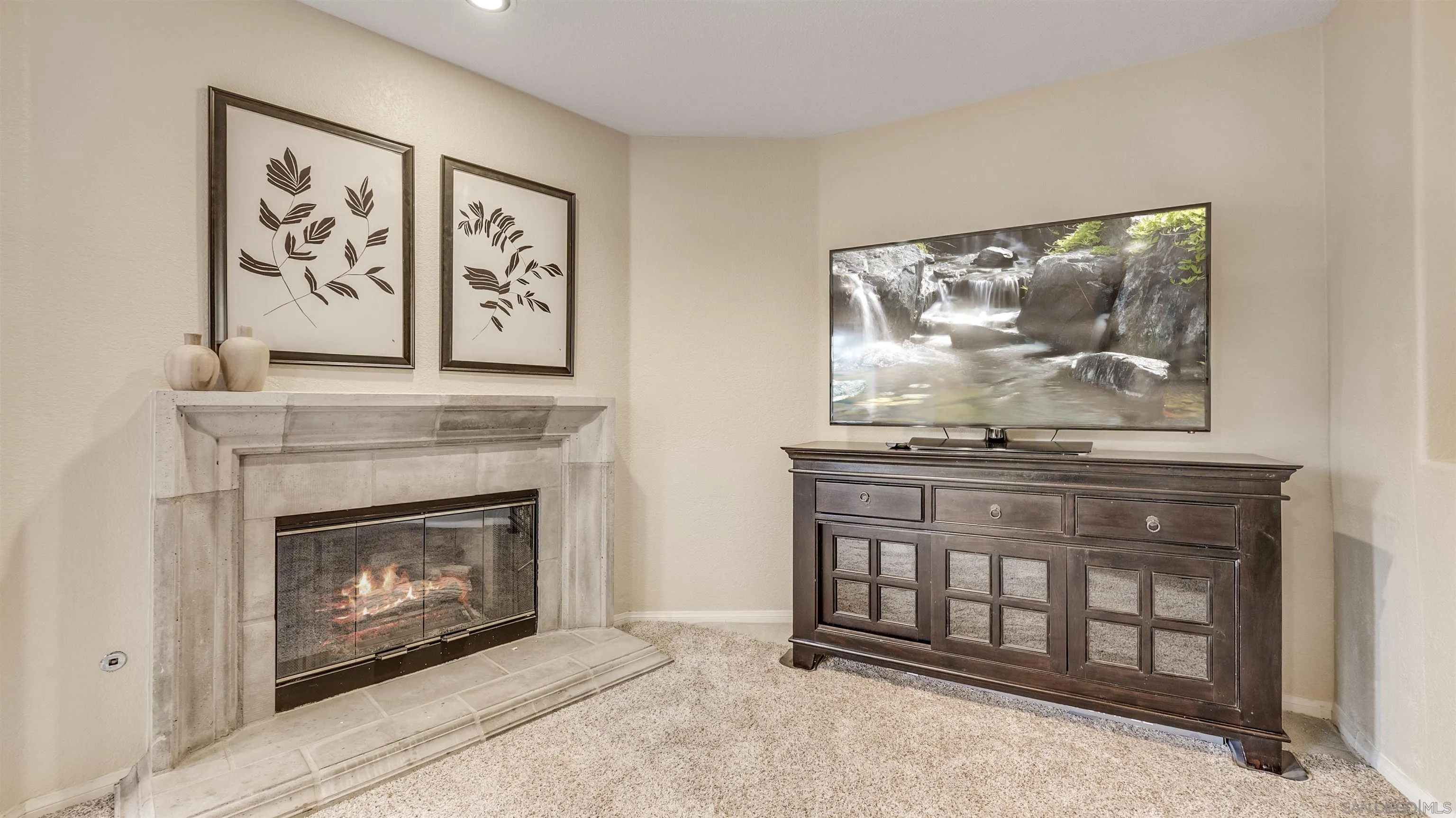 2352 Rock Crest Glen Escondido, CA 92026 - Photo 38 of 48 a view of a fireplace with painting on the wall