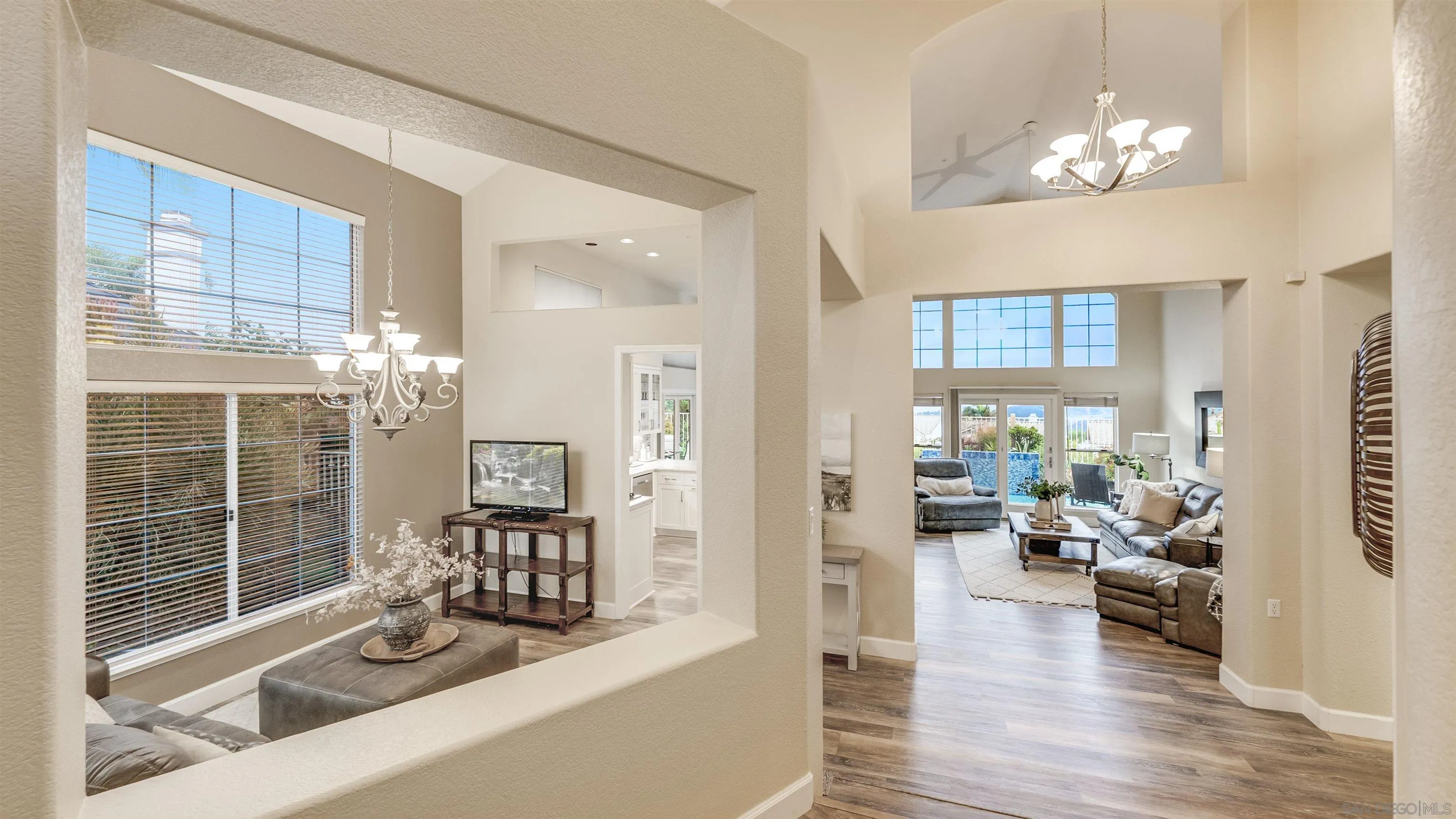 2352 Rock Crest Glen Escondido, CA 92026 - Photo 40 of 48 a living room with furniture and a chandelier