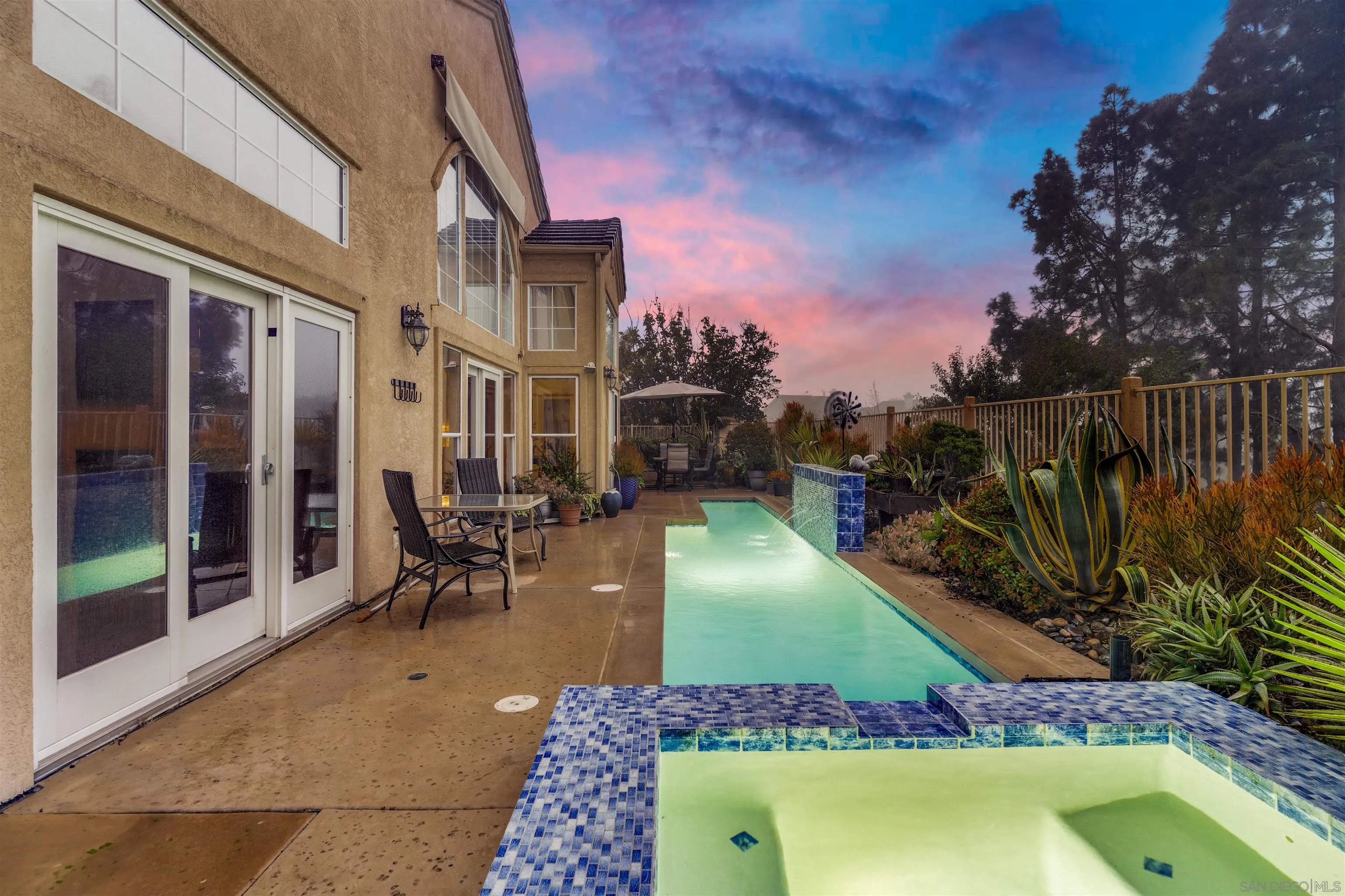 2352 Rock Crest Glen Escondido, CA 92026 - Photo 4 of 48 a balcony with table and chairs