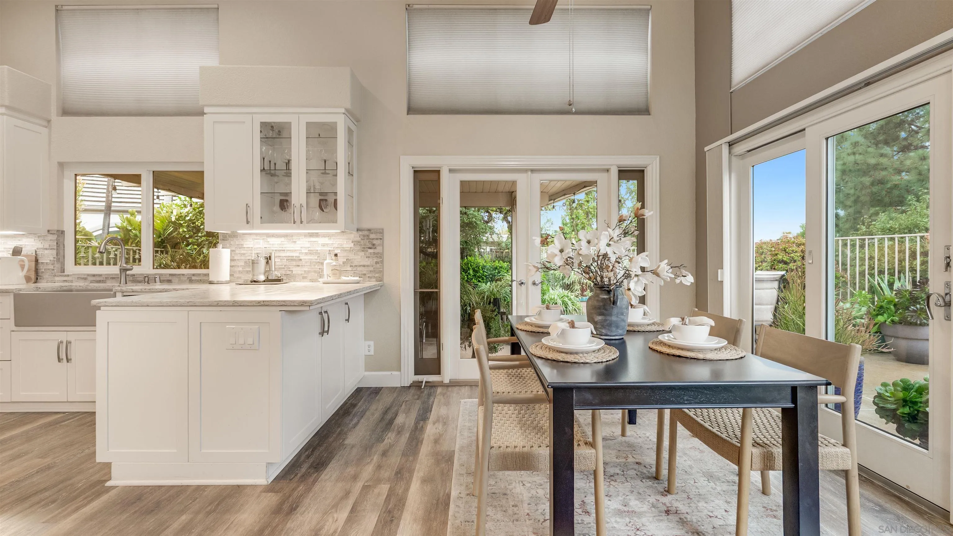 2352 Rock Crest Glen Escondido, CA 92026 - Photo 41 of 48 a kitchen with a table chairs and entryway