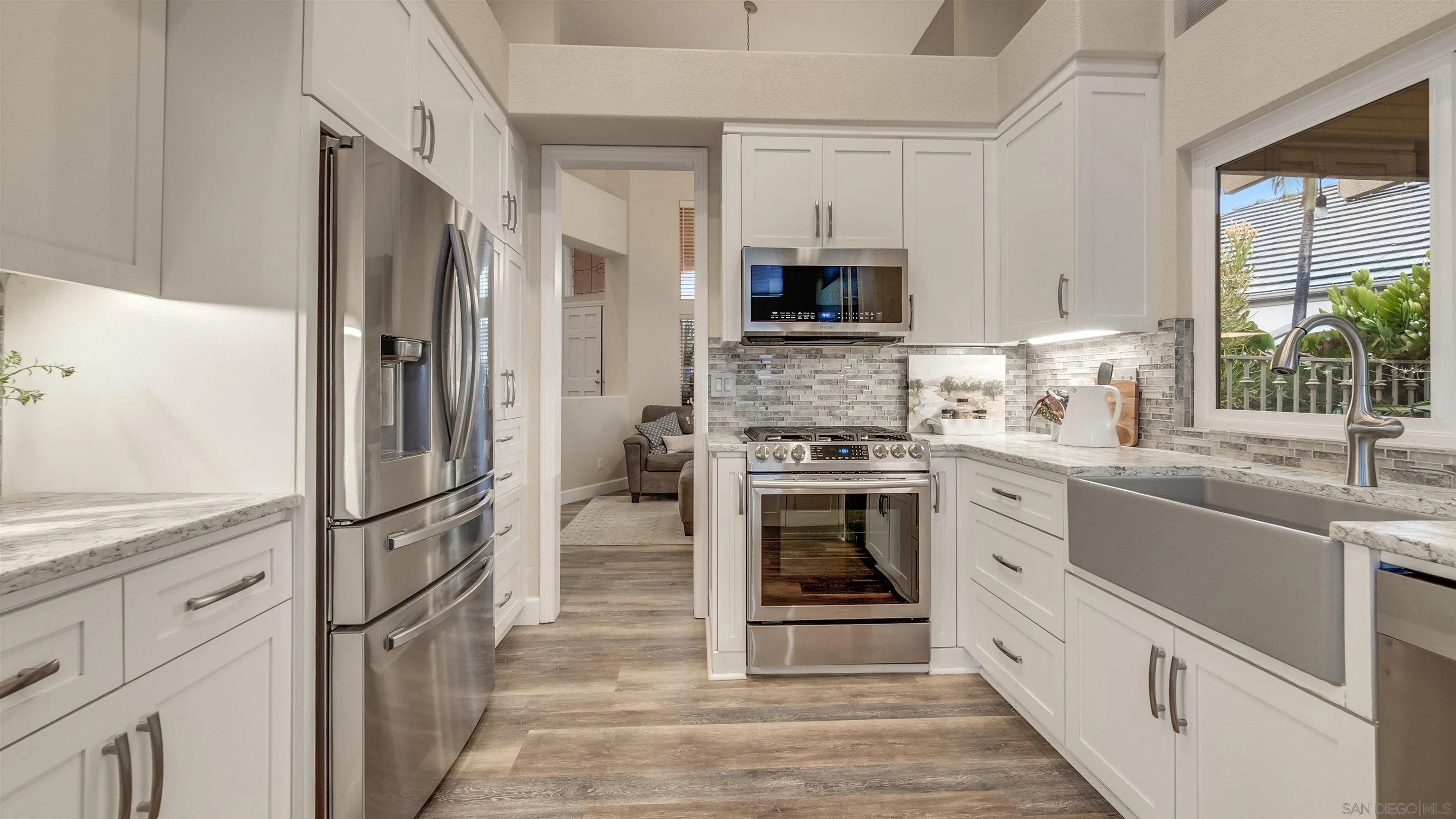 2352 Rock Crest Glen Escondido, CA 92026 - Photo 42 of 48 a kitchen with stainless steel appliances granite countertop a refrigerator and a stove