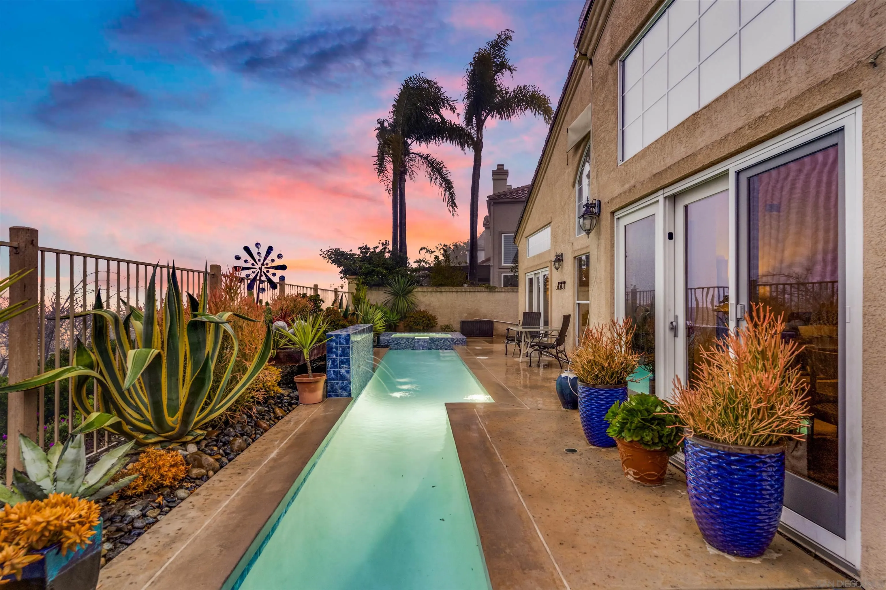 2352 Rock Crest Glen Escondido, CA 92026 - Photo 5 of 48 a view of a potted flower in a corridor