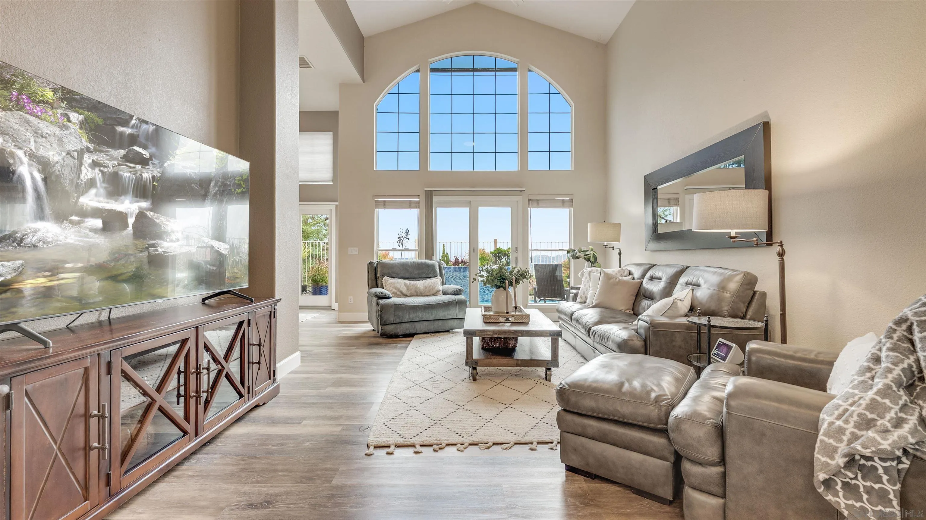 2352 Rock Crest Glen Escondido, CA 92026 - Photo 7 of 48 a living room with furniture fireplace and a large window