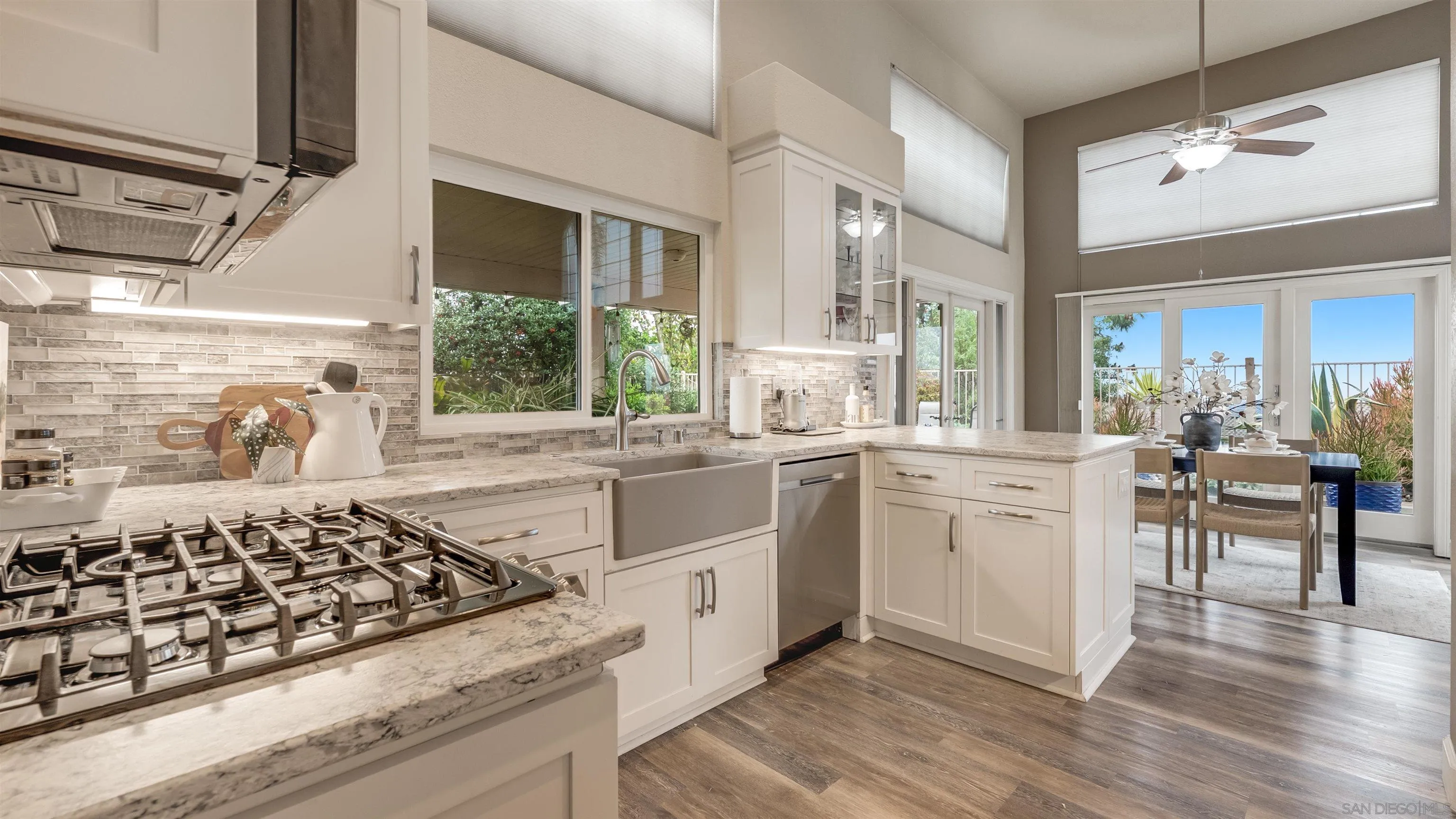 2352 Rock Crest Glen Escondido, CA 92026 - Photo 10 of 48 a kitchen with a stove a sink and a refrigerator