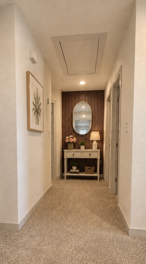 10924 Meris Lane Austin, TX 78754 - Photo 15 of 20 Hallway featuring plush carpeting and neutral wall tones