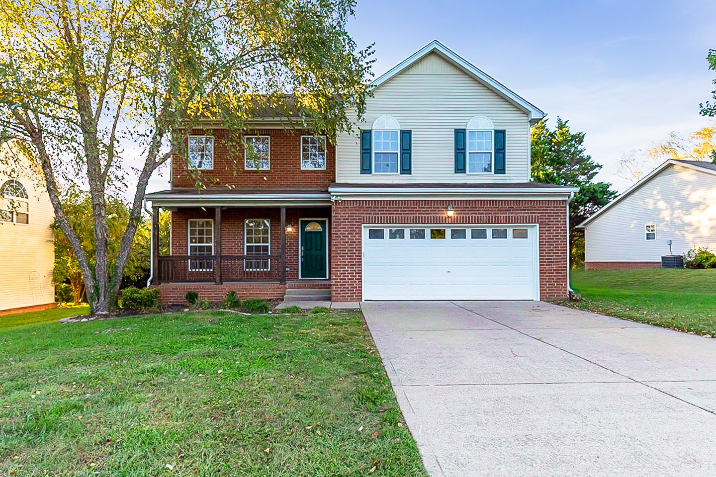 1945 Portway Road Spring Hill, TN 37174 - Photo 1 of 26 front view of a house with a yard