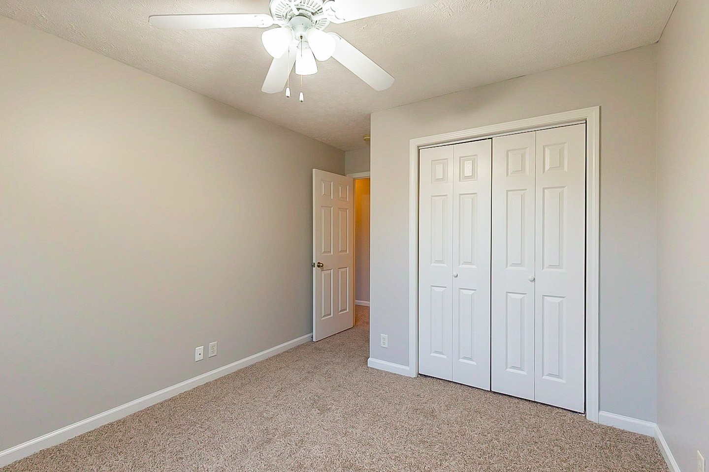 1945 Portway Road Spring Hill, TN 37174 - Photo 17 of 26 an empty room with a chandelier fan