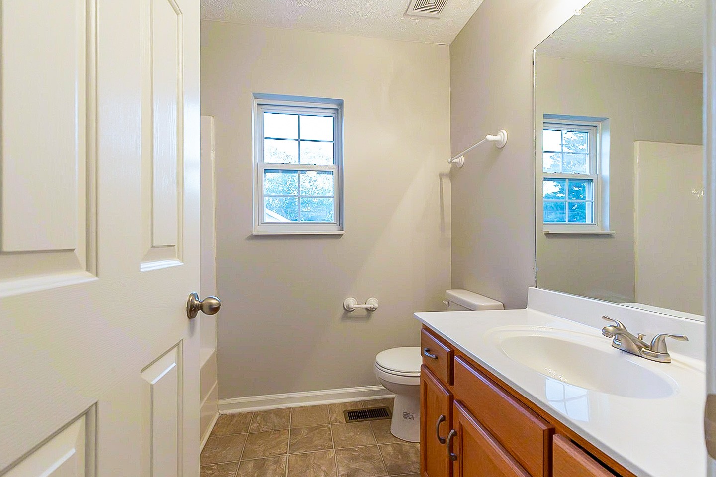 1945 Portway Road Spring Hill, TN 37174 - Photo 18 of 26 a bathroom with a sink toilet and shower