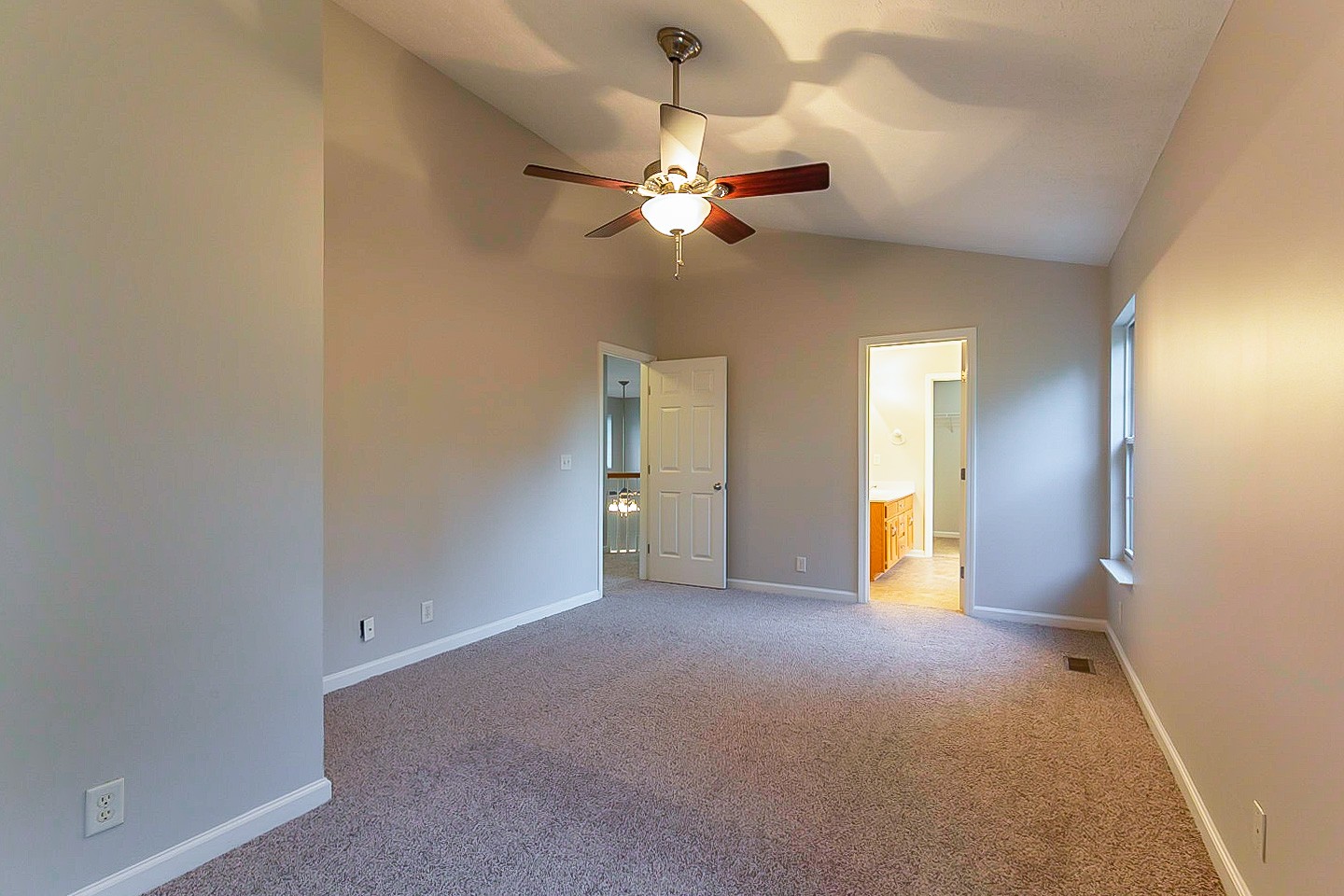 1945 Portway Road Spring Hill, TN 37174 - Photo 22 of 26 a view of a livingroom with a chandelier fan and windows