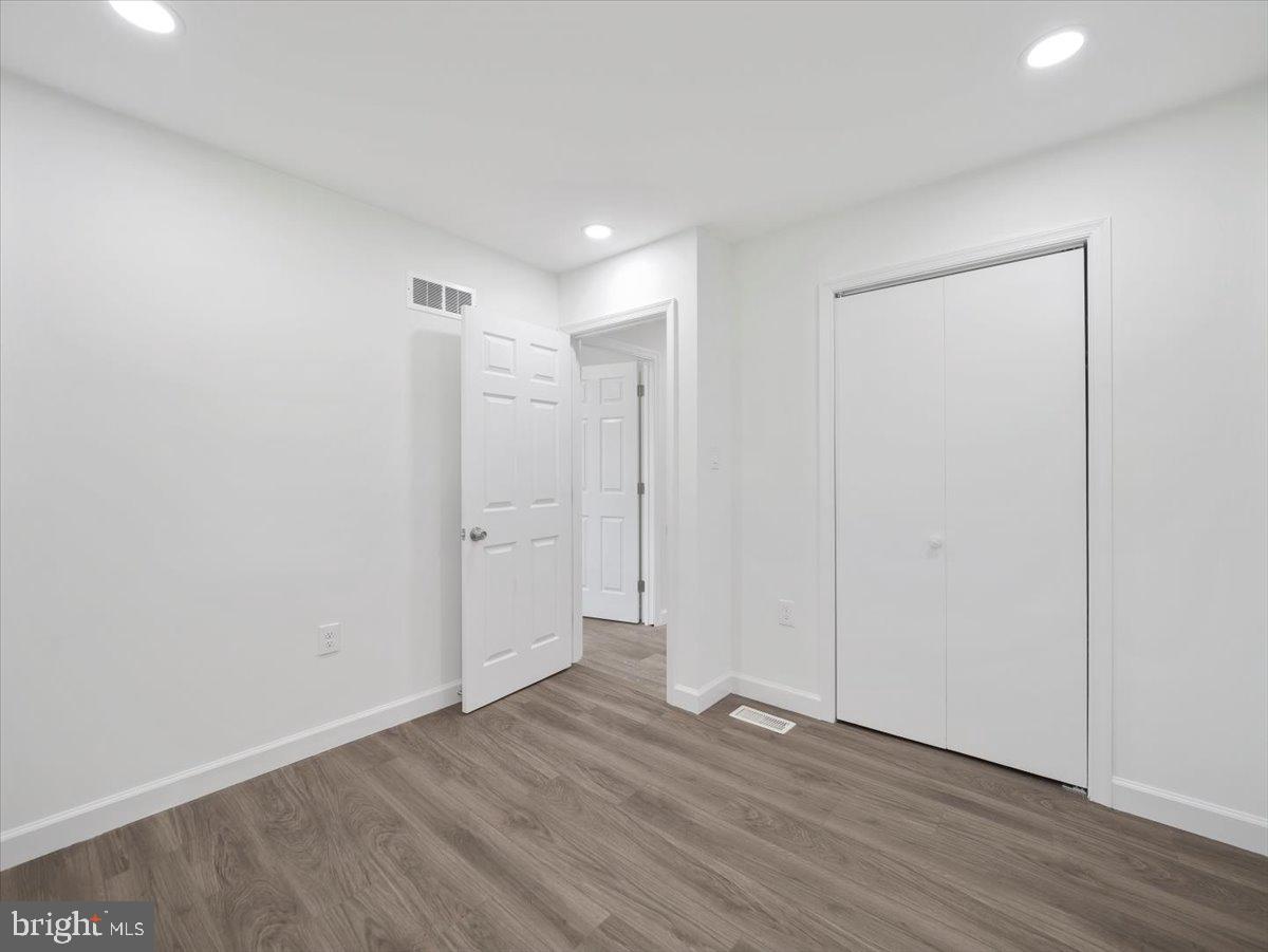 8704 Orndorff Road Thurmont, MD 21788 - Photo 14 of 43 a view of an empty room with wooden floor