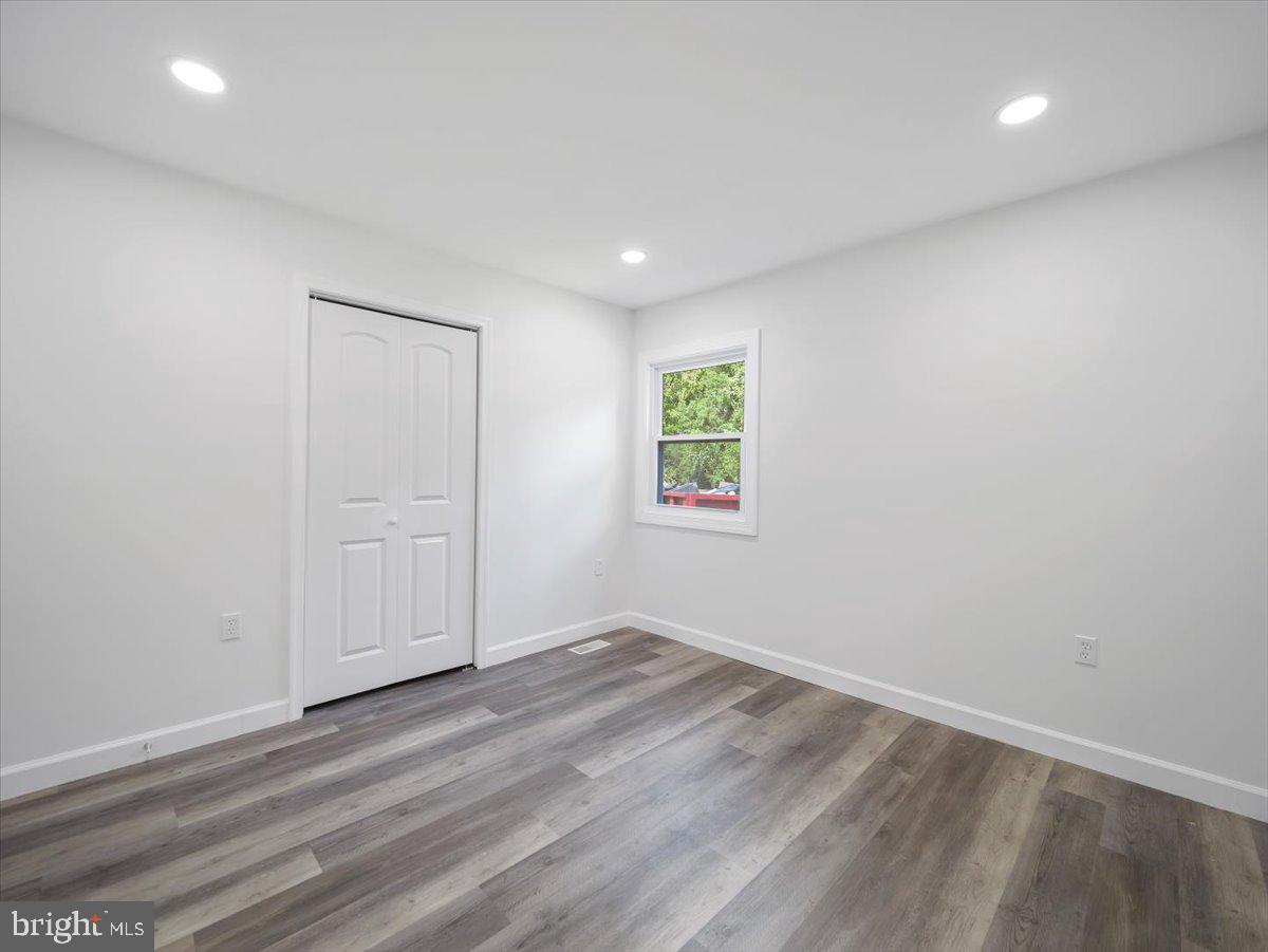 8704 Orndorff Road Thurmont, MD 21788 - Photo 20 of 43 an empty room with windows and closet