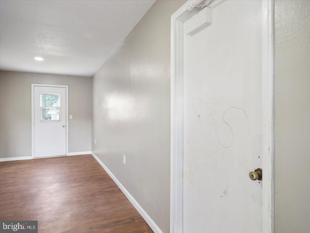 8704 Orndorff Road Thurmont, MD 21788 - Photo 28 of 43 a view of a hallway with wooden floor
