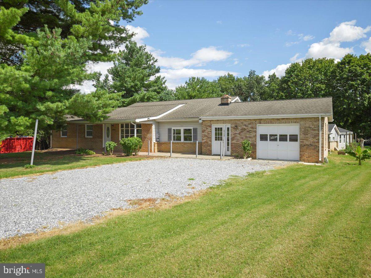8704 Orndorff Road Thurmont, MD 21788 - Photo 3 of 43 a view of house with outdoor space and garden