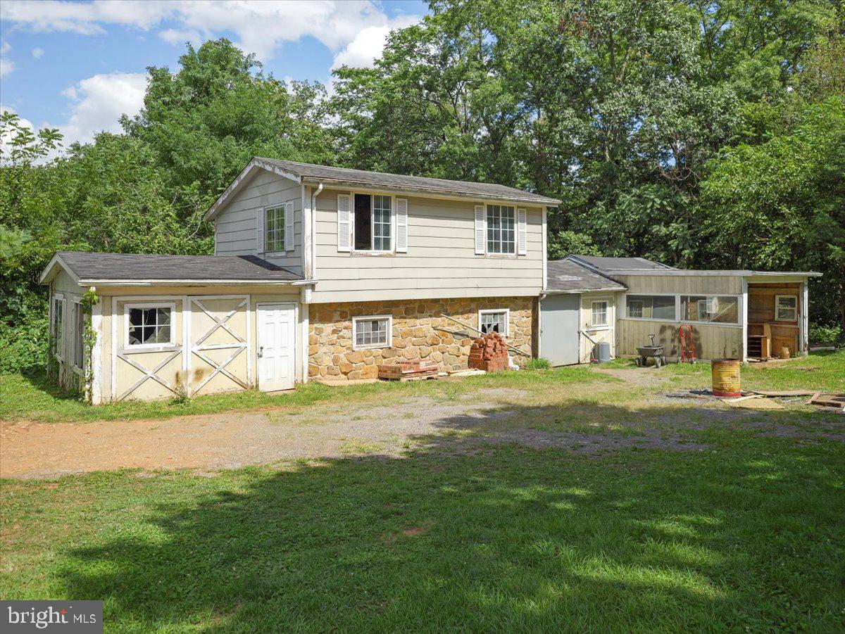 8704 Orndorff Road Thurmont, MD 21788 - Photo 42 of 43 a front view of a house with a yard