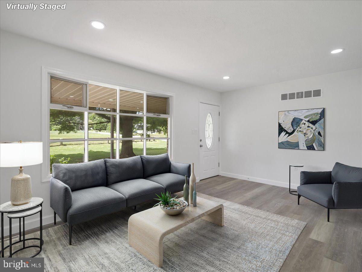 8704 Orndorff Road Thurmont, MD 21788 - Photo 5 of 43 a living room with furniture and a large window