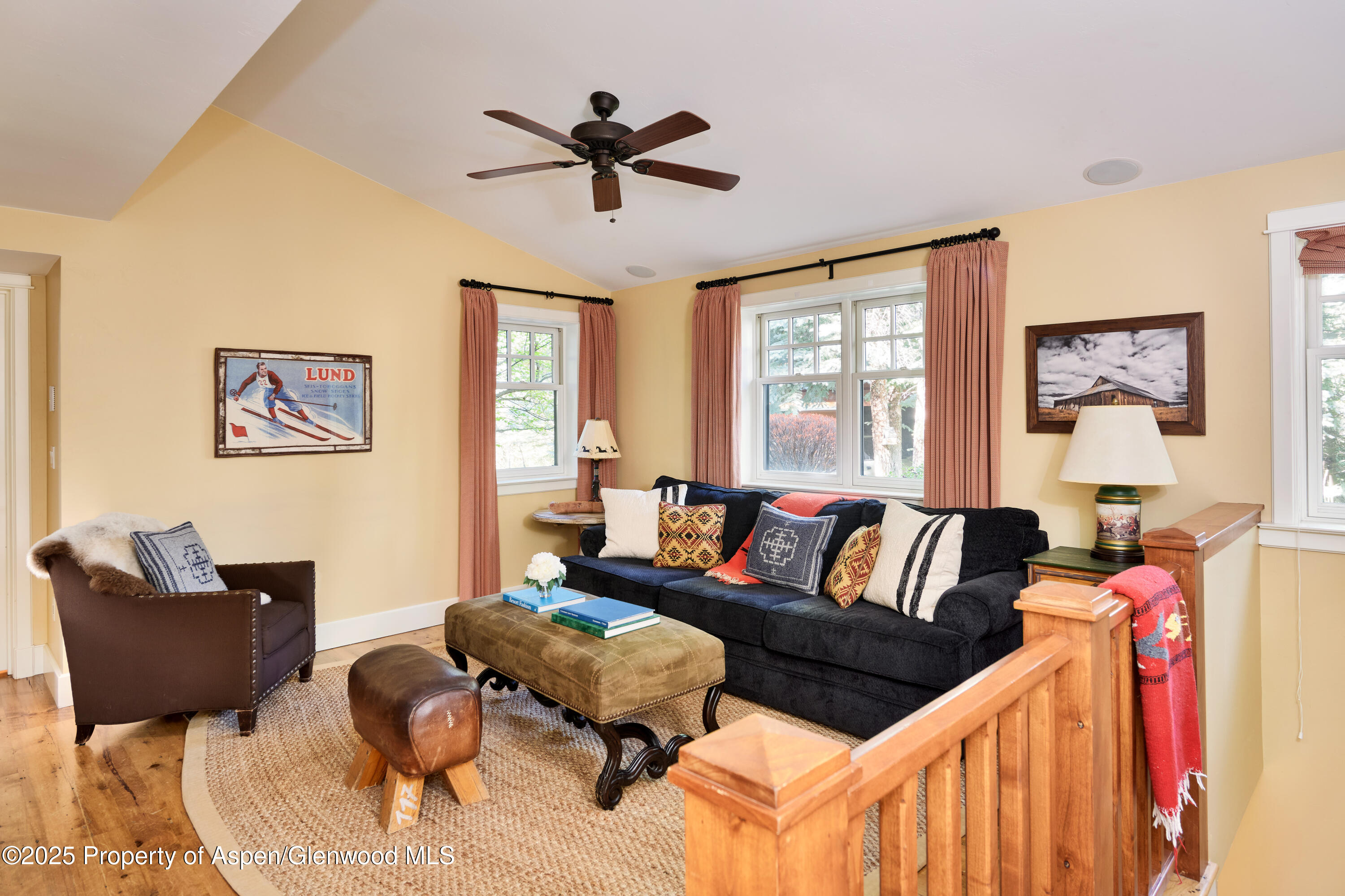 1900-1470 Snowmass Creek Road Snowmass, CO 81654 - Photo 12 of 105 a living room with furniture ceiling fan and a window