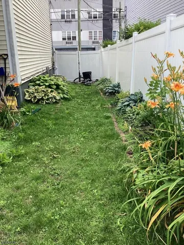 a view of a backyard with plants