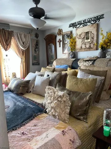 a bedroom with furniture and a bed