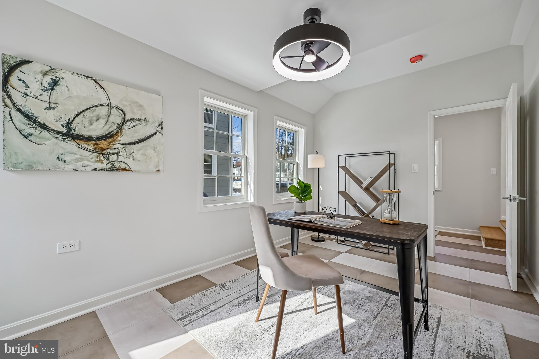 721 Mapleton Road Rockville, MD 20850 - Photo 15 of 36 a view of a dining room that has a table and a chair
