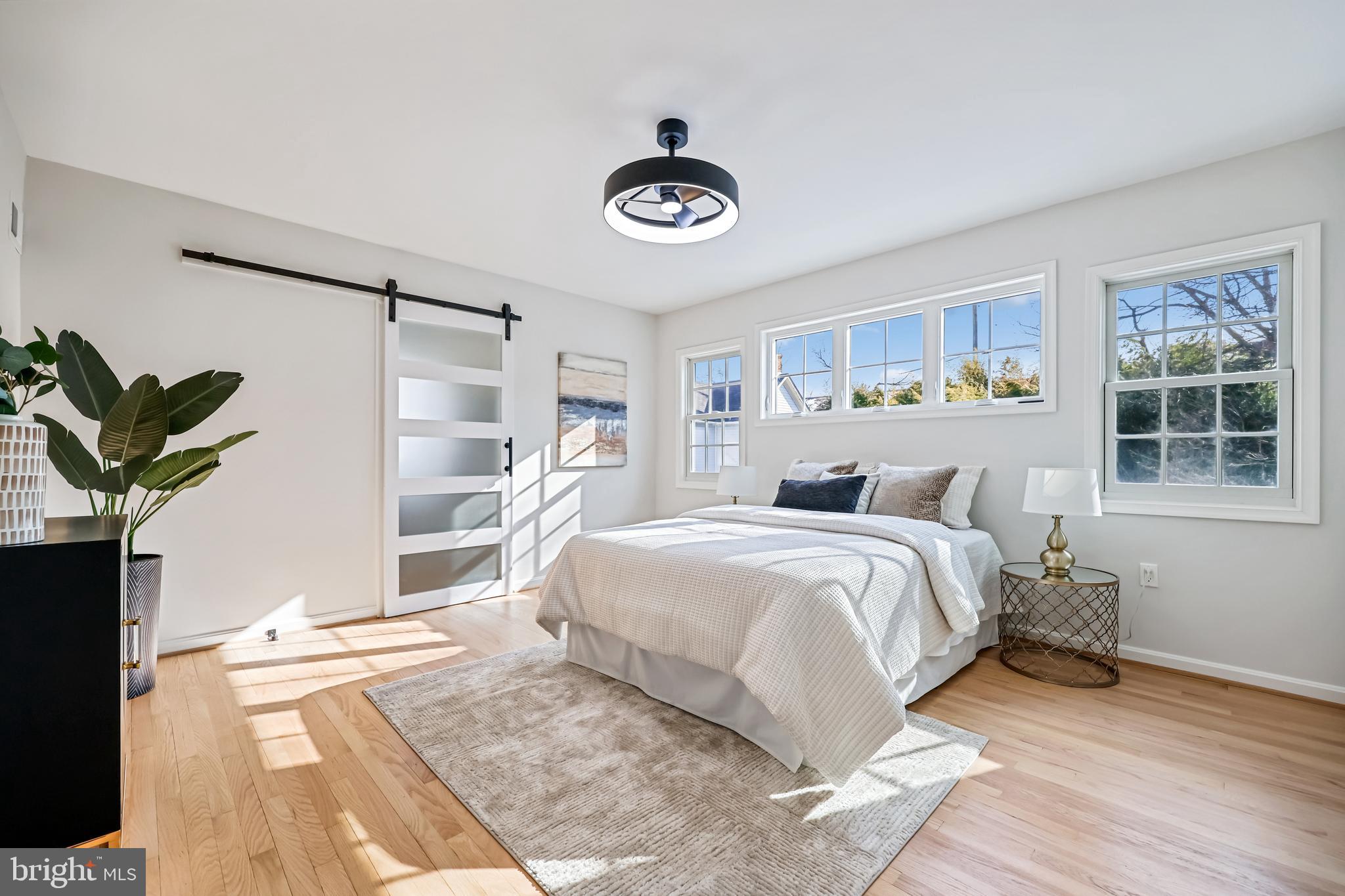 721 Mapleton Road Rockville, MD 20850 - Photo 20 of 36 a bedroom with a bed and a window