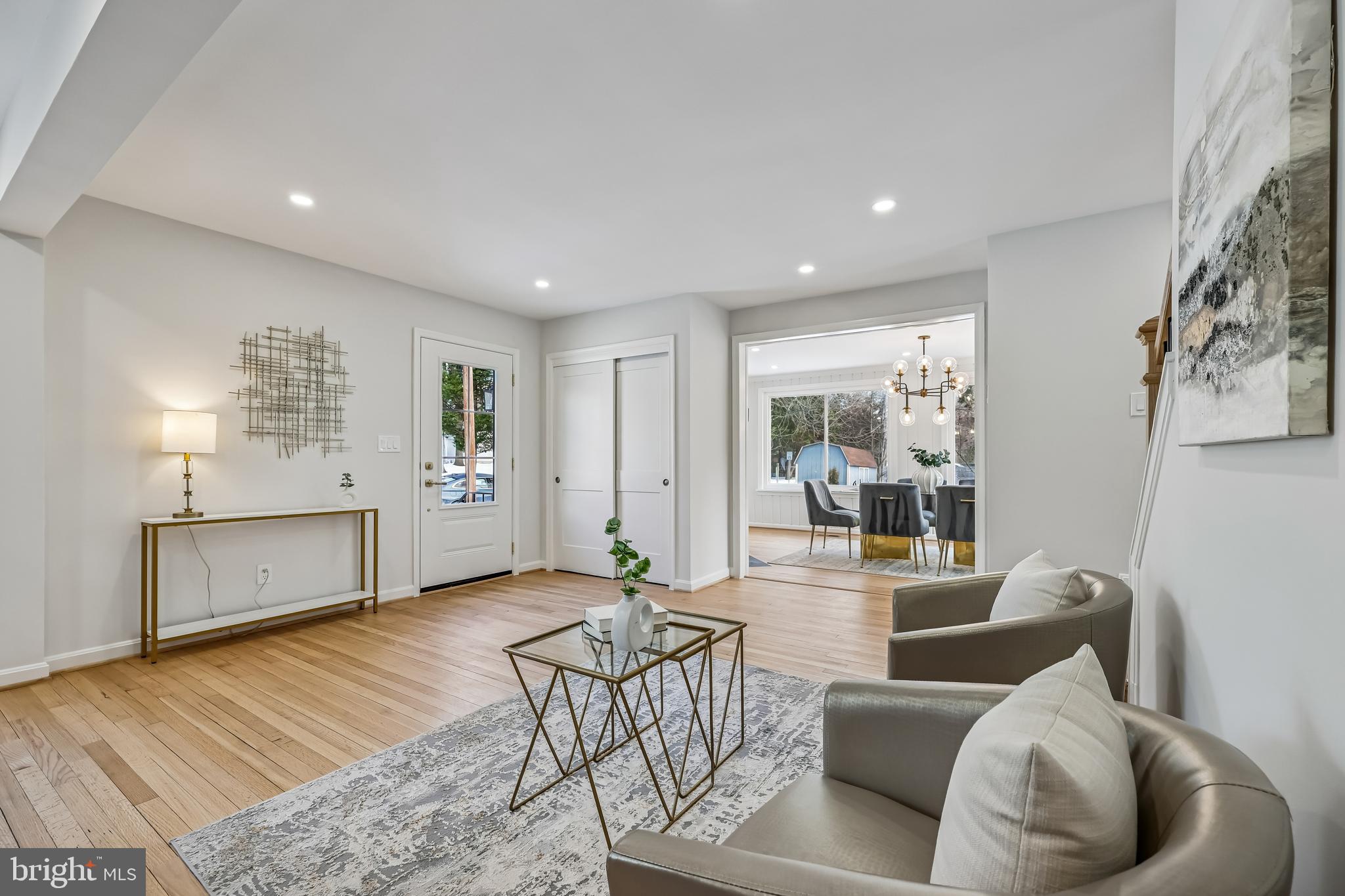 721 Mapleton Road Rockville, MD 20850 - Photo 2 of 36 a living room with furniture and a table
