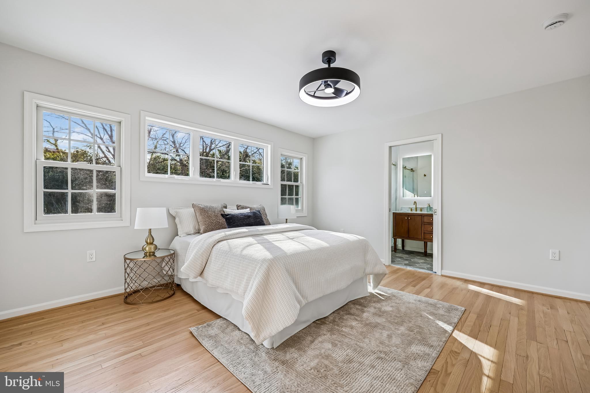 721 Mapleton Road Rockville, MD 20850 - Photo 22 of 36 a bedroom with a bed and a window