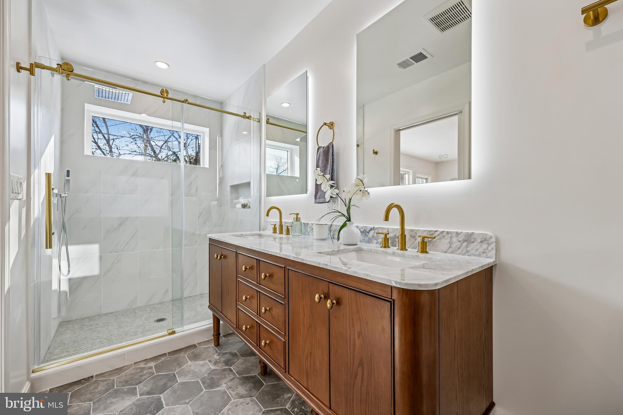 721 Mapleton Road Rockville, MD 20850 - Photo 23 of 36 a bathroom with a granite countertop sink mirror and double