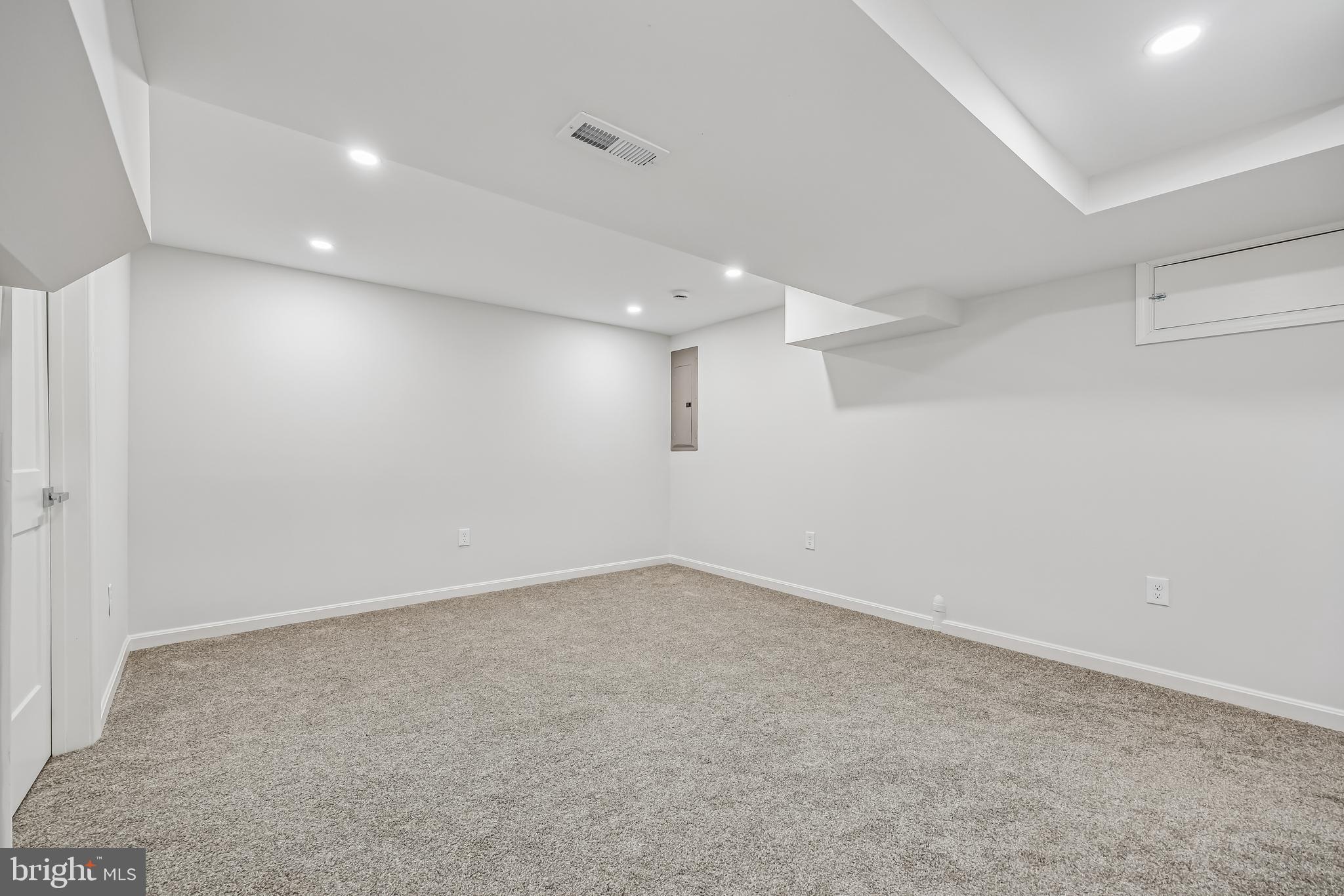 721 Mapleton Road Rockville, MD 20850 - Photo 30 of 36 an empty room with a empty space and windows