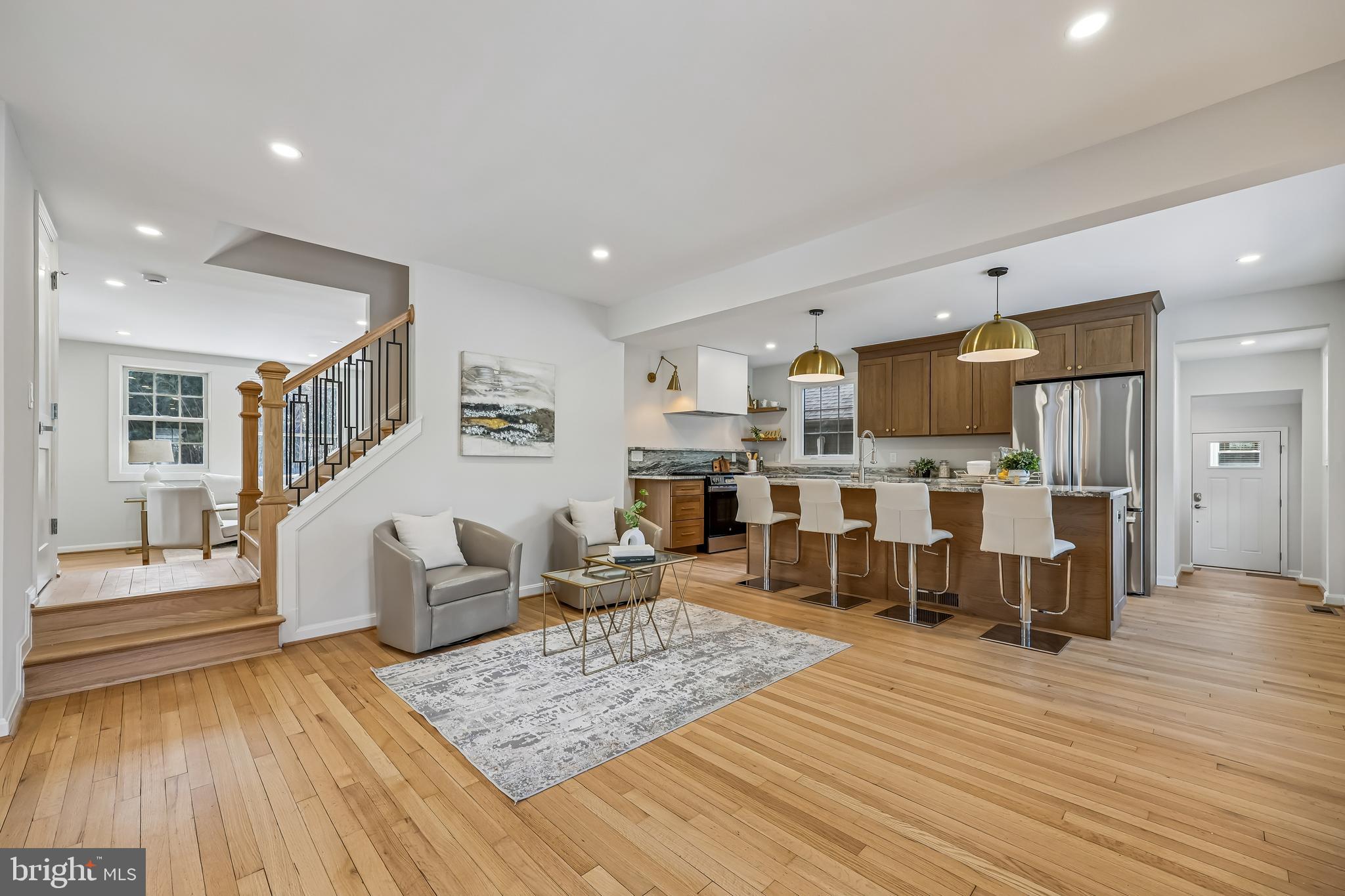 721 Mapleton Road Rockville, MD 20850 - Photo 4 of 36 a living room with furniture and kitchen view