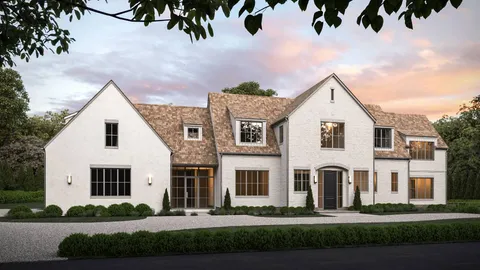 a view of white house with a yard