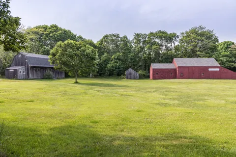 a view of a pool with a yard