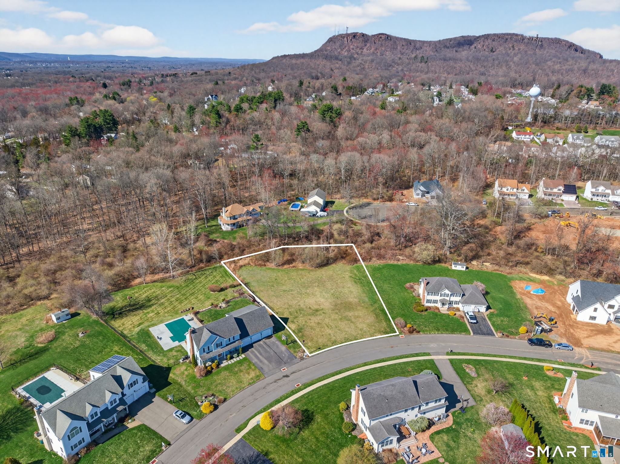 an aerial view of a house with a garden