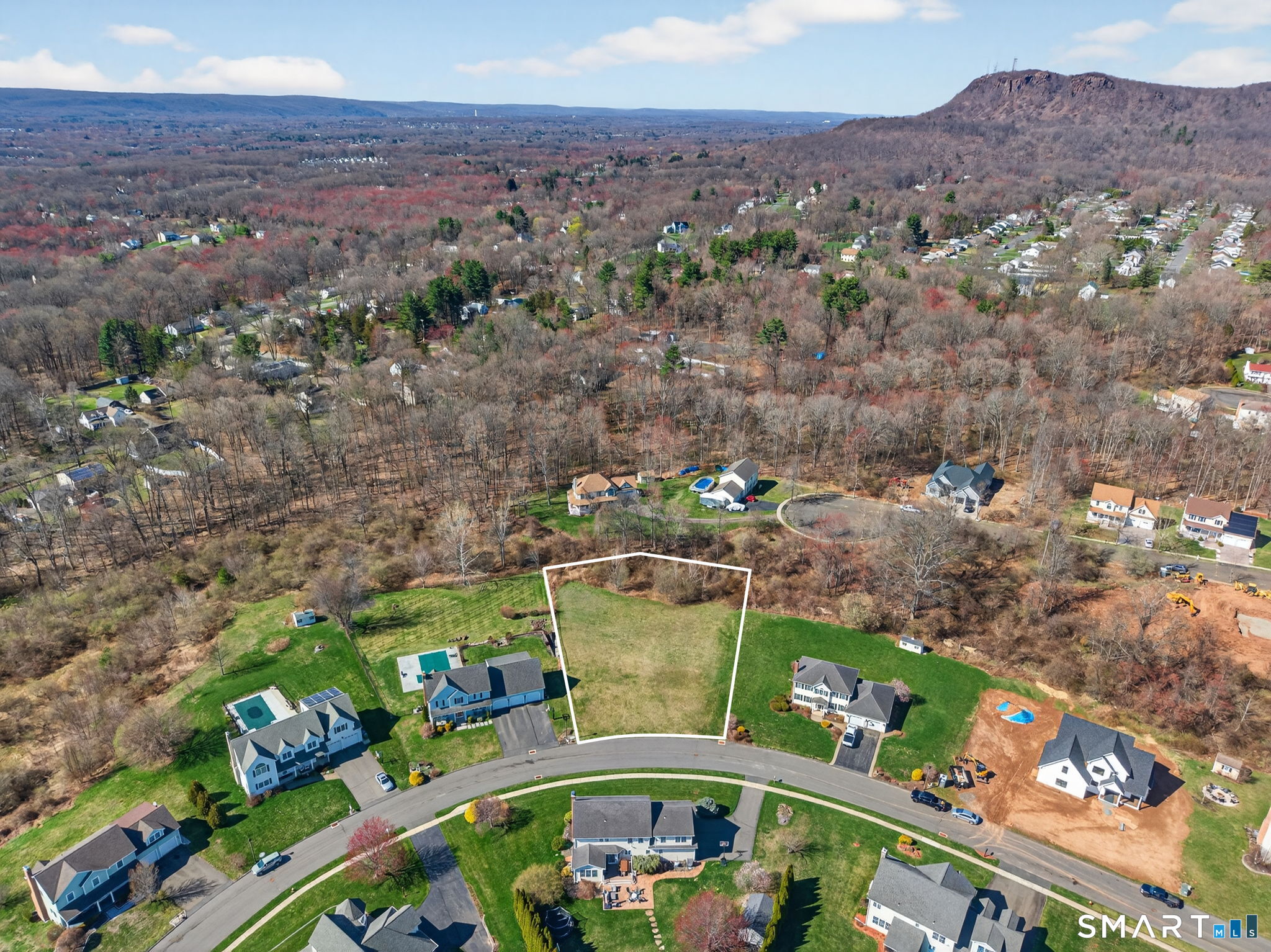 170 Debbie Drive Meriden, CT 06451 - Photo 14 of 19 an aerial view of a swimming pool a playground and mountain view in back