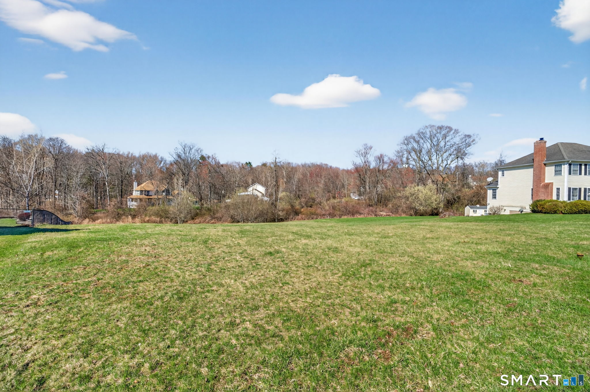 170 Debbie Drive Meriden, CT 06451 - Photo 5 of 19 a view of a big yard of grass and trees