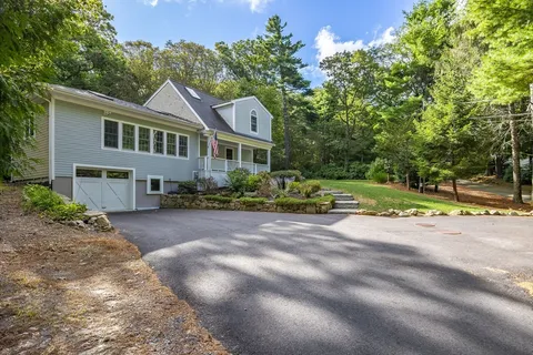 a view of a house with a garden