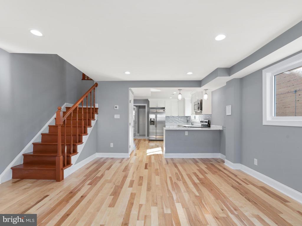 5237 Karl Place Northeast Washington, DC 20019 - Photo 6 of 44 Living Room views stairs + Kitchen