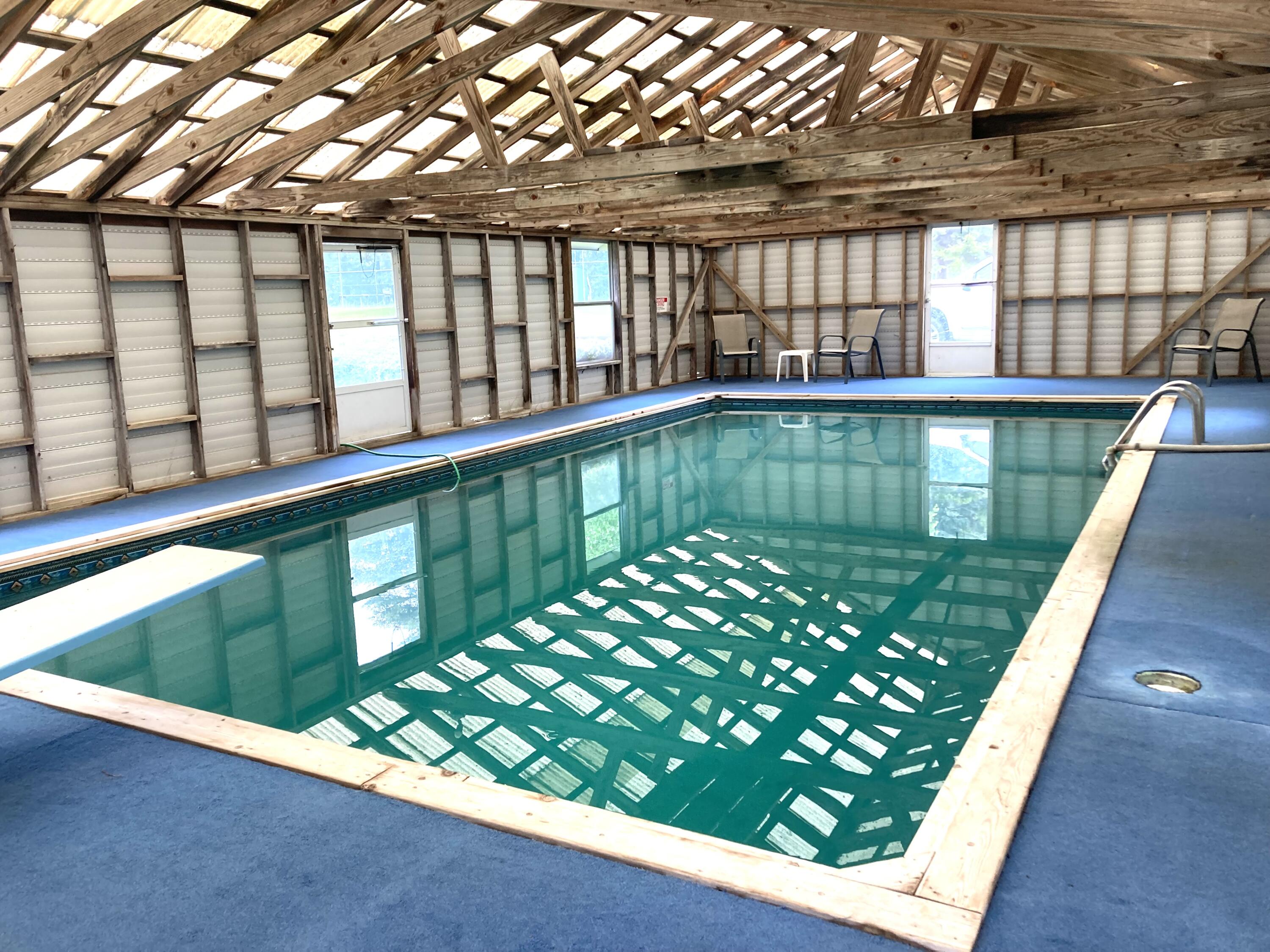 1 Francis Road Steuben, ME 04680 - Photo 28 of 30 Heated, enclosed pool.